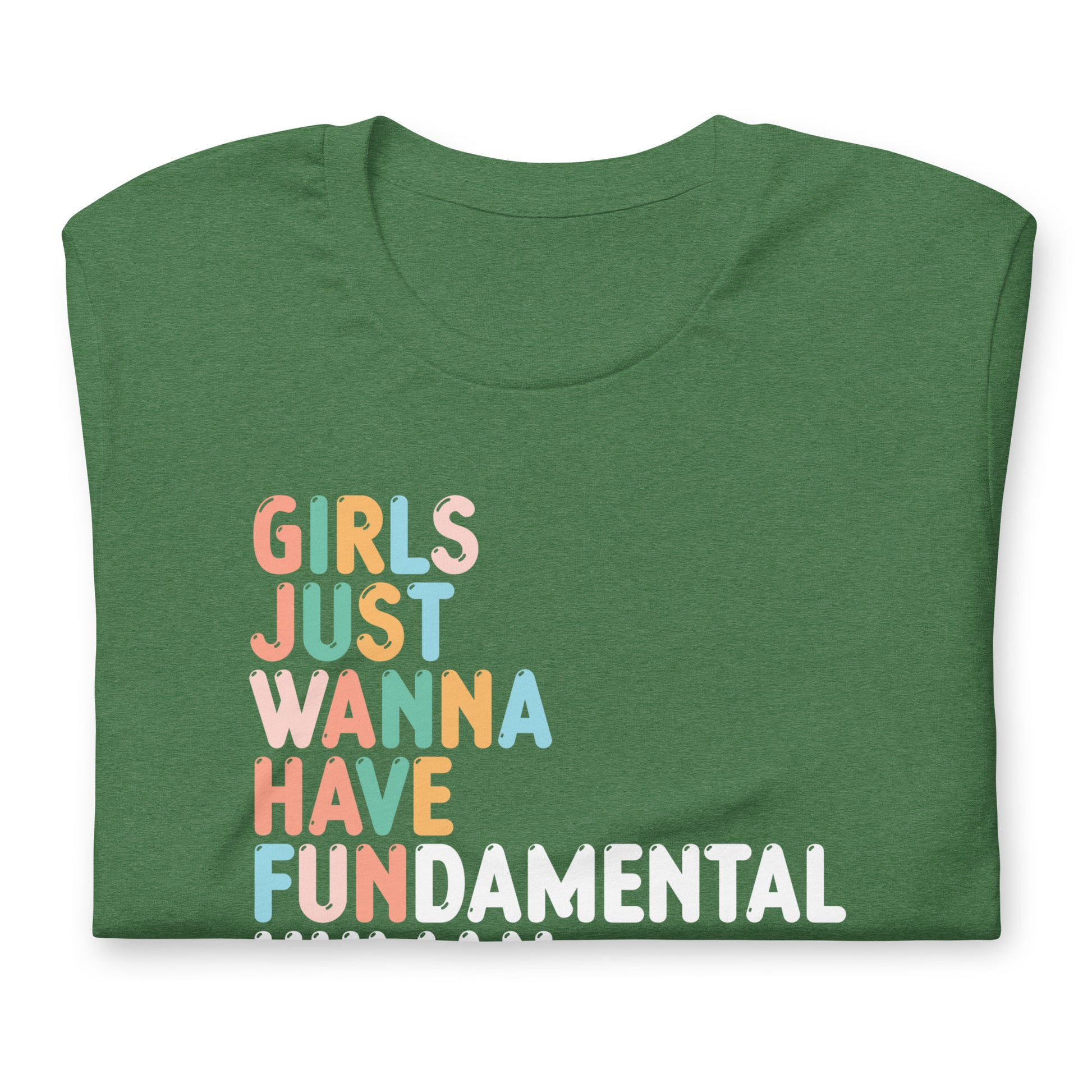 Folded heather green unisex t-shirt featuring retro stacked typography reading “GIRLS JUST WANNA HAVE FUNDAMENTAL HUMAN RIGHTS,” progressive feminist apparel.