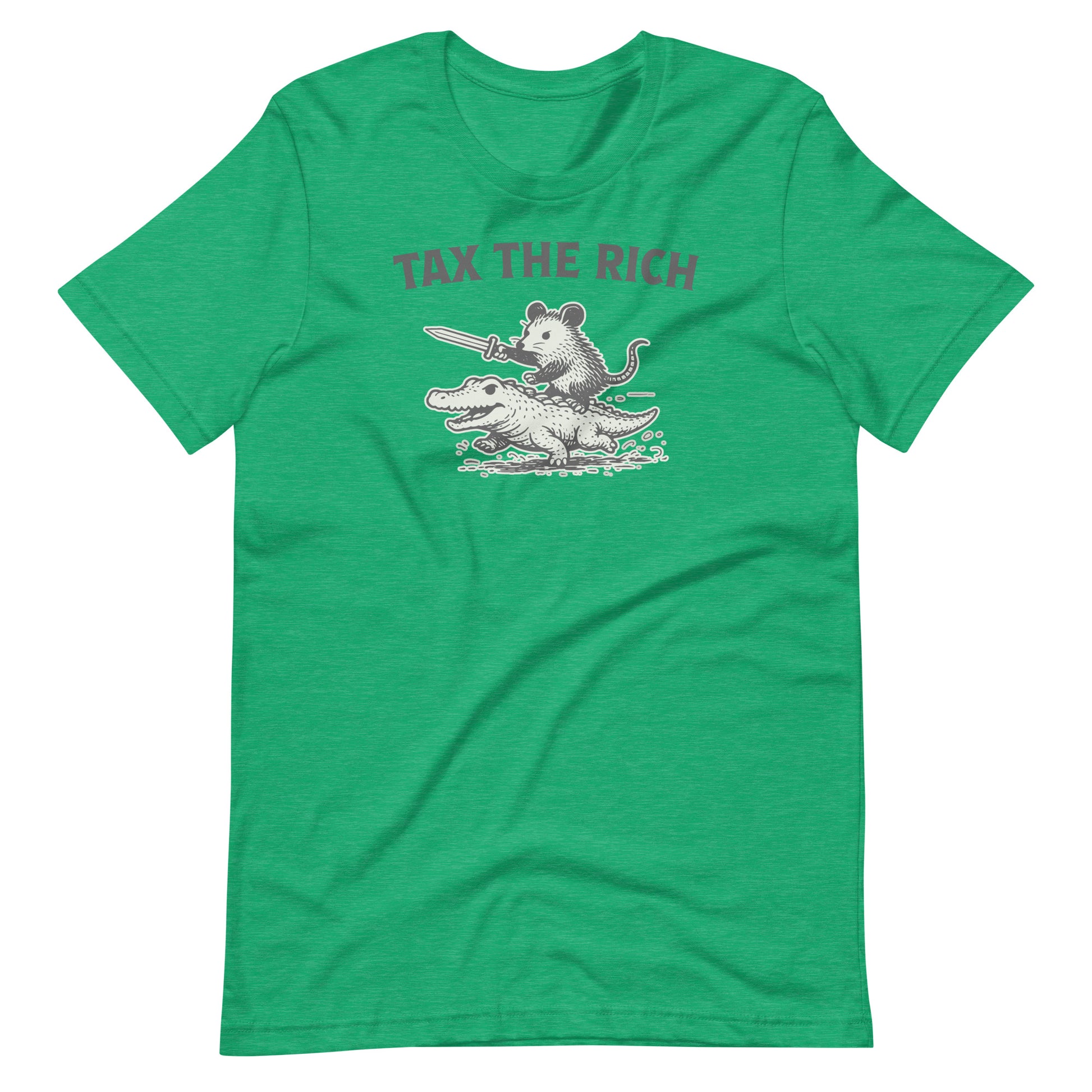 Heather kelly green unisex t-shirt featuring a folk-art inspired opossum riding an alligator with bold “Tax the Rich” lettering and vintage protest-inspired artwork.