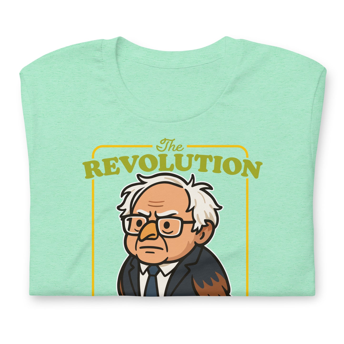 Folded heather mint unisex T-shirt displaying cartoon Birdie Sanders artwork with “The Revolution Will Be Tweeted” phrase in playful activist design.