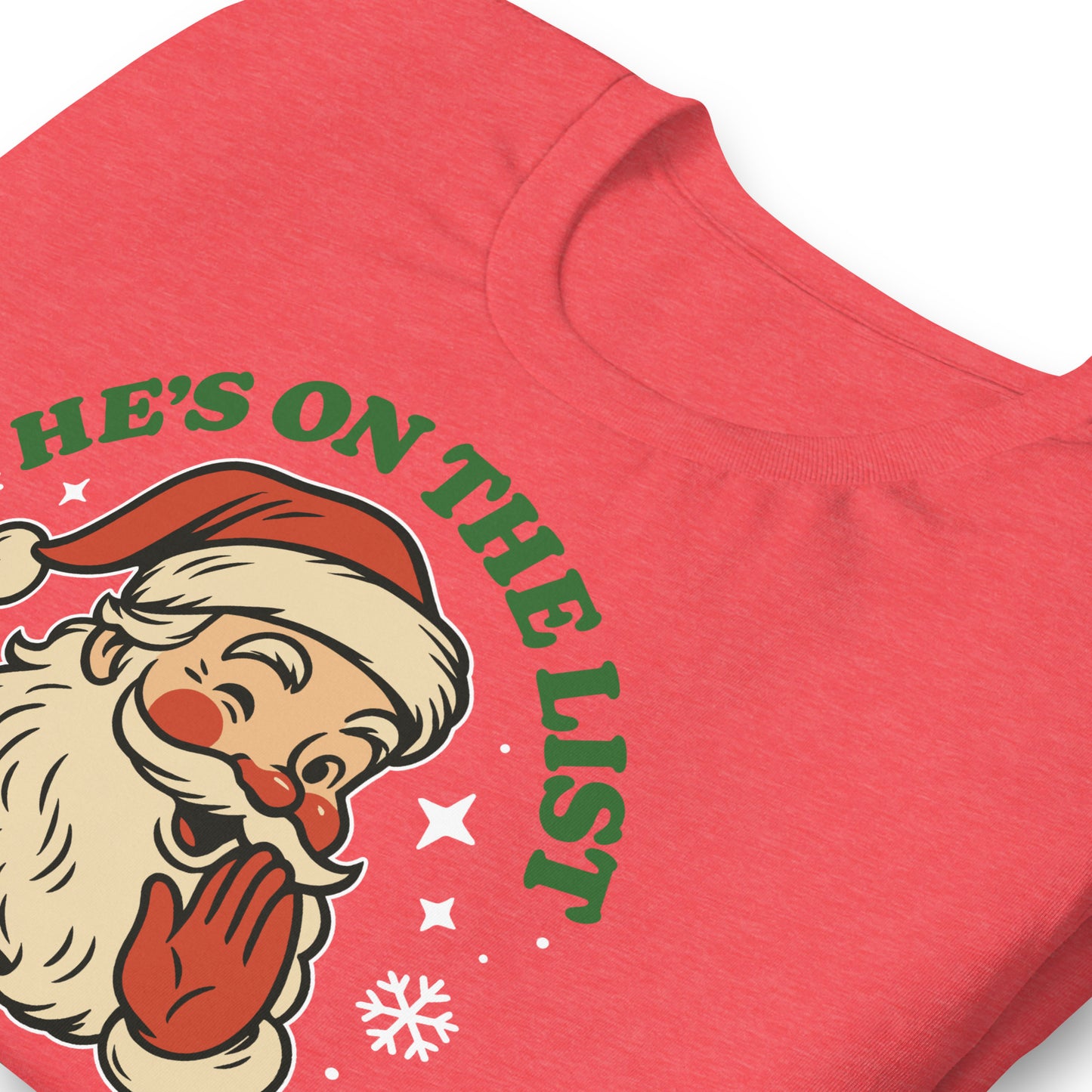 Close-up of the Santa print on a red tee, highlighting the distressed vintage style and creamy retro colors.