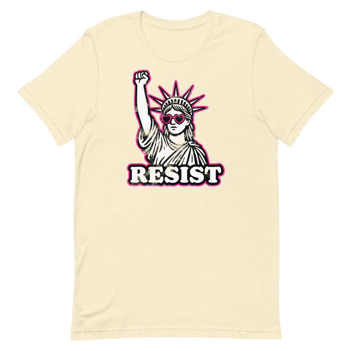 Cream “RESIST” shirt with the raised-fist Lady Liberty design in contrasting black and pink tones.