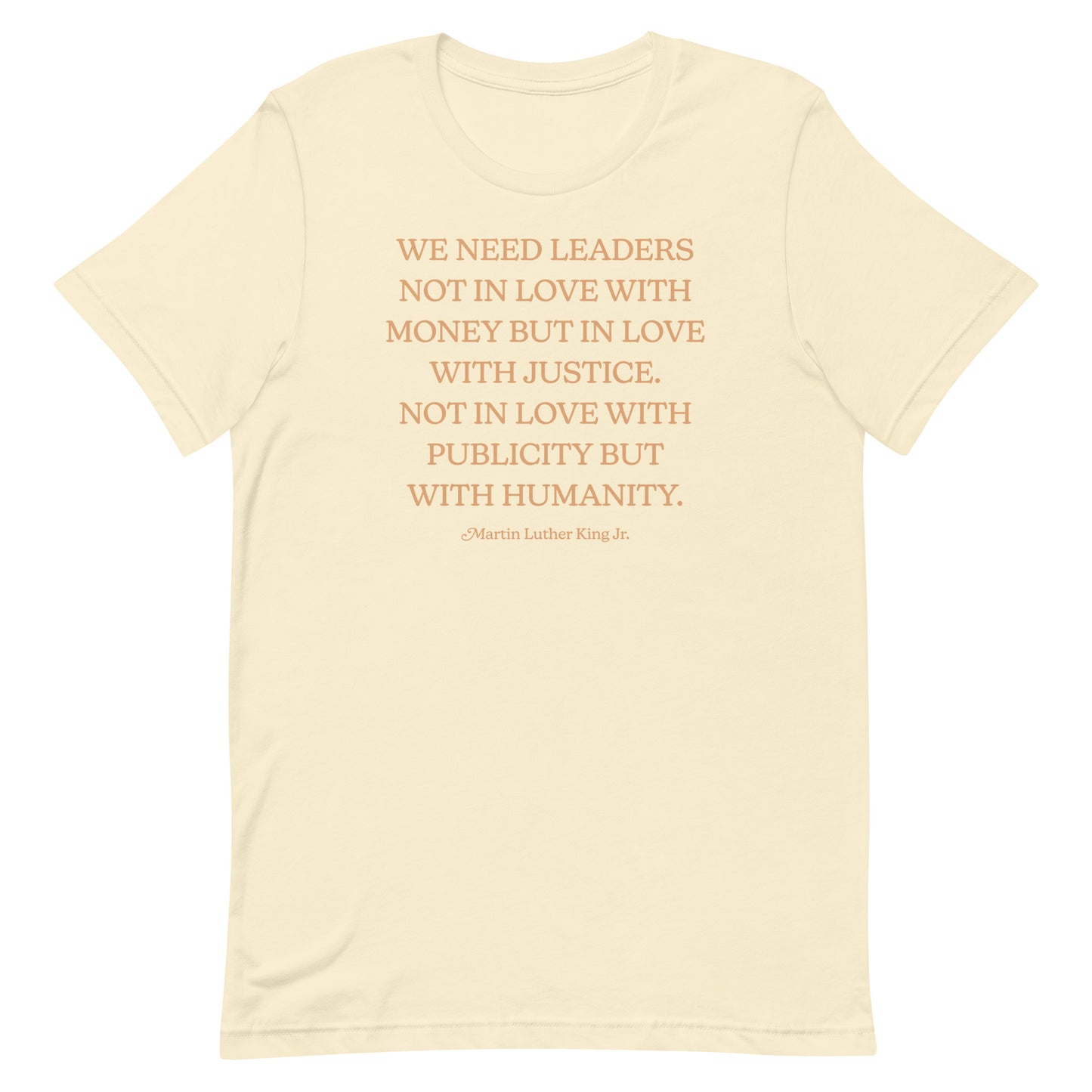 Cream shirt printed with MLK’s justice-centered quote in a minimalist serif layout. A hopeful design supporting ethical leadership.