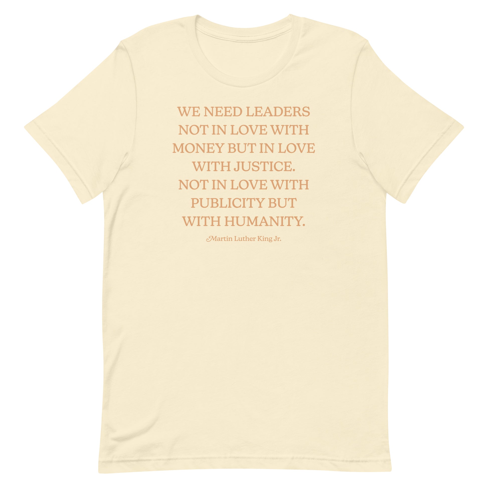 Cream shirt printed with MLK’s justice-centered quote in a minimalist serif layout. A hopeful design supporting ethical leadership.
