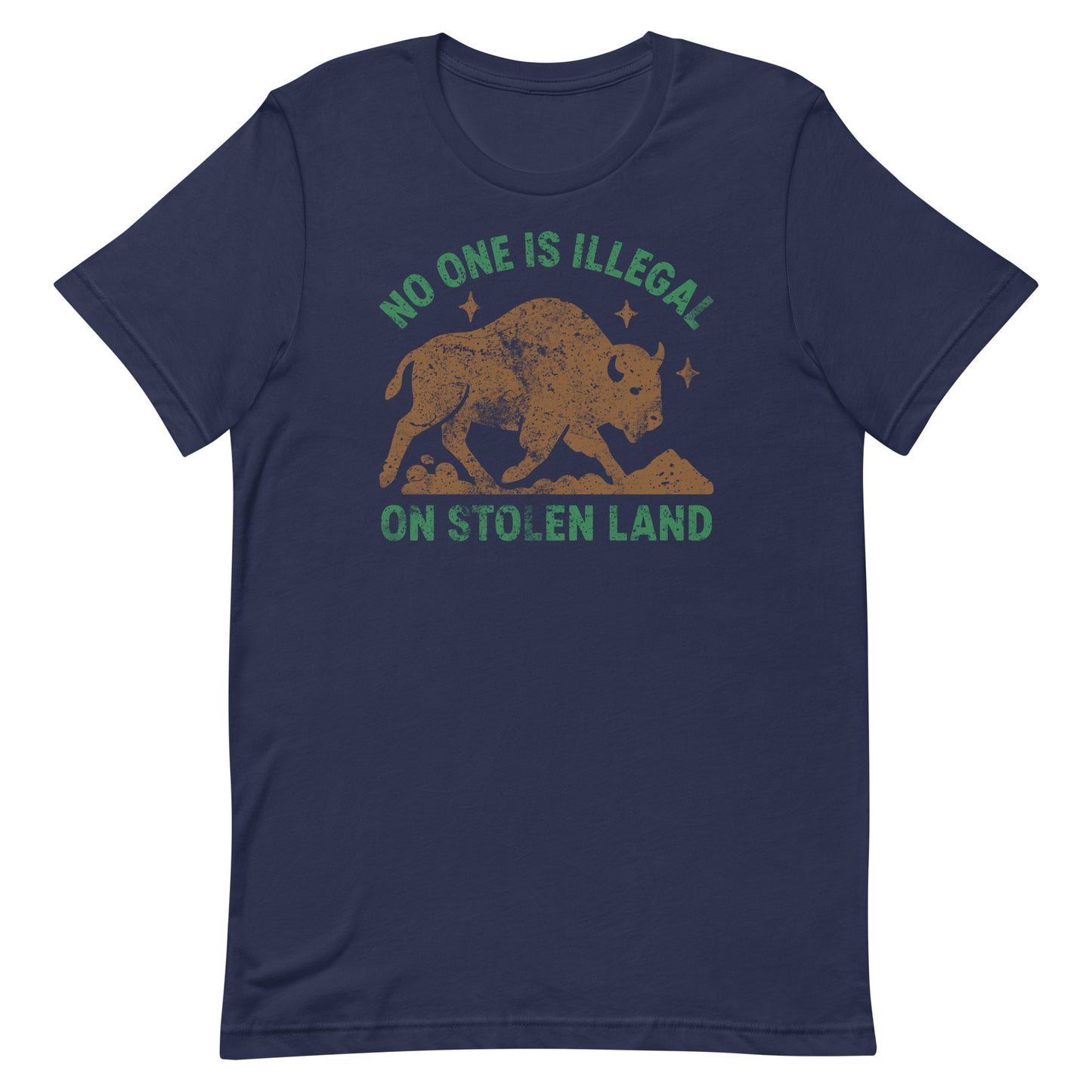 Navy unisex tee printed with a buff-colored buffalo silhouette and stars above the message “NO ONE IS ILLEGAL ON STOLEN LAND,” a subtle pro-Indigenous rights design from Blue Wave USA.