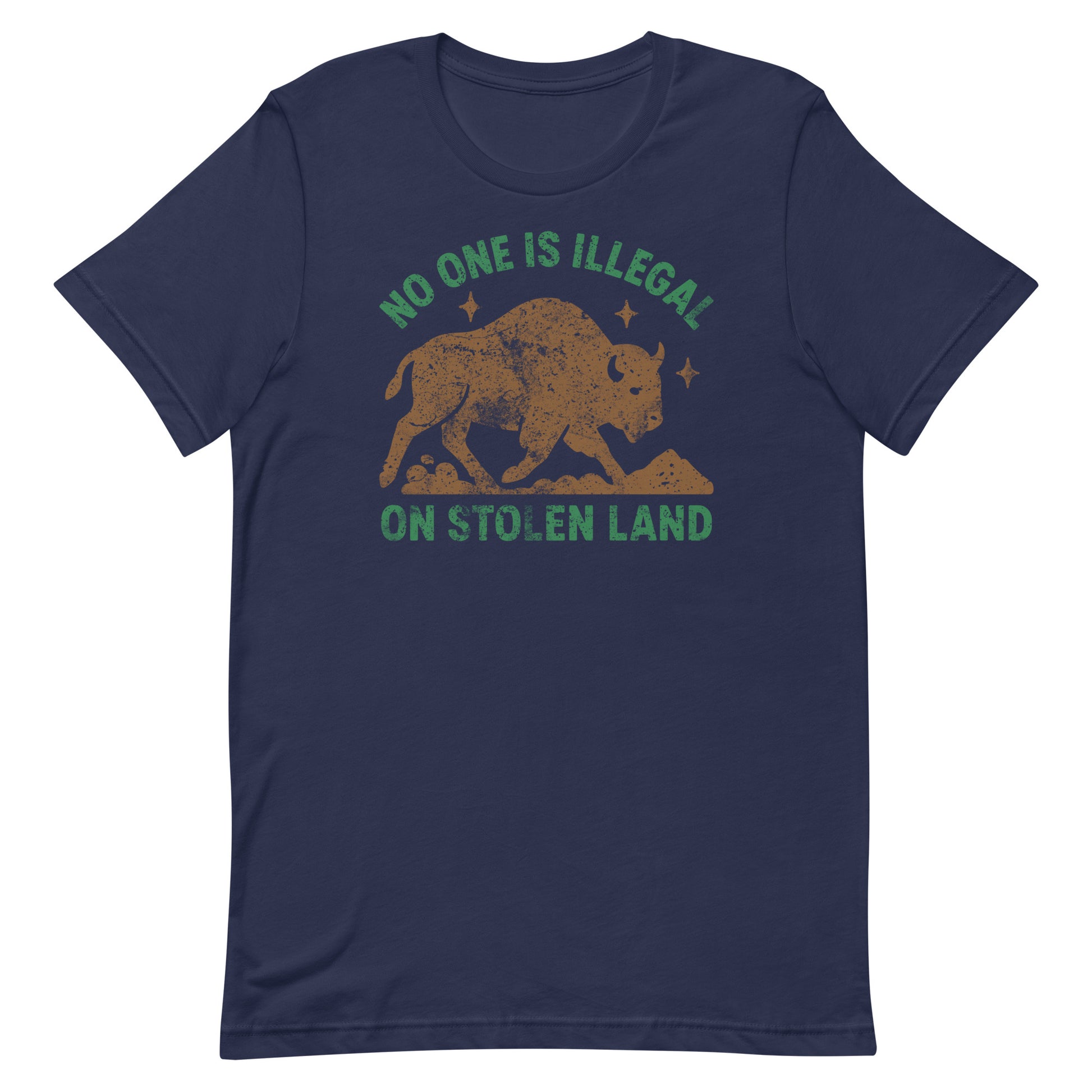 Navy unisex tee printed with a buff-colored buffalo silhouette and stars above the message “NO ONE IS ILLEGAL ON STOLEN LAND,” a subtle pro-Indigenous rights design from Blue Wave USA.