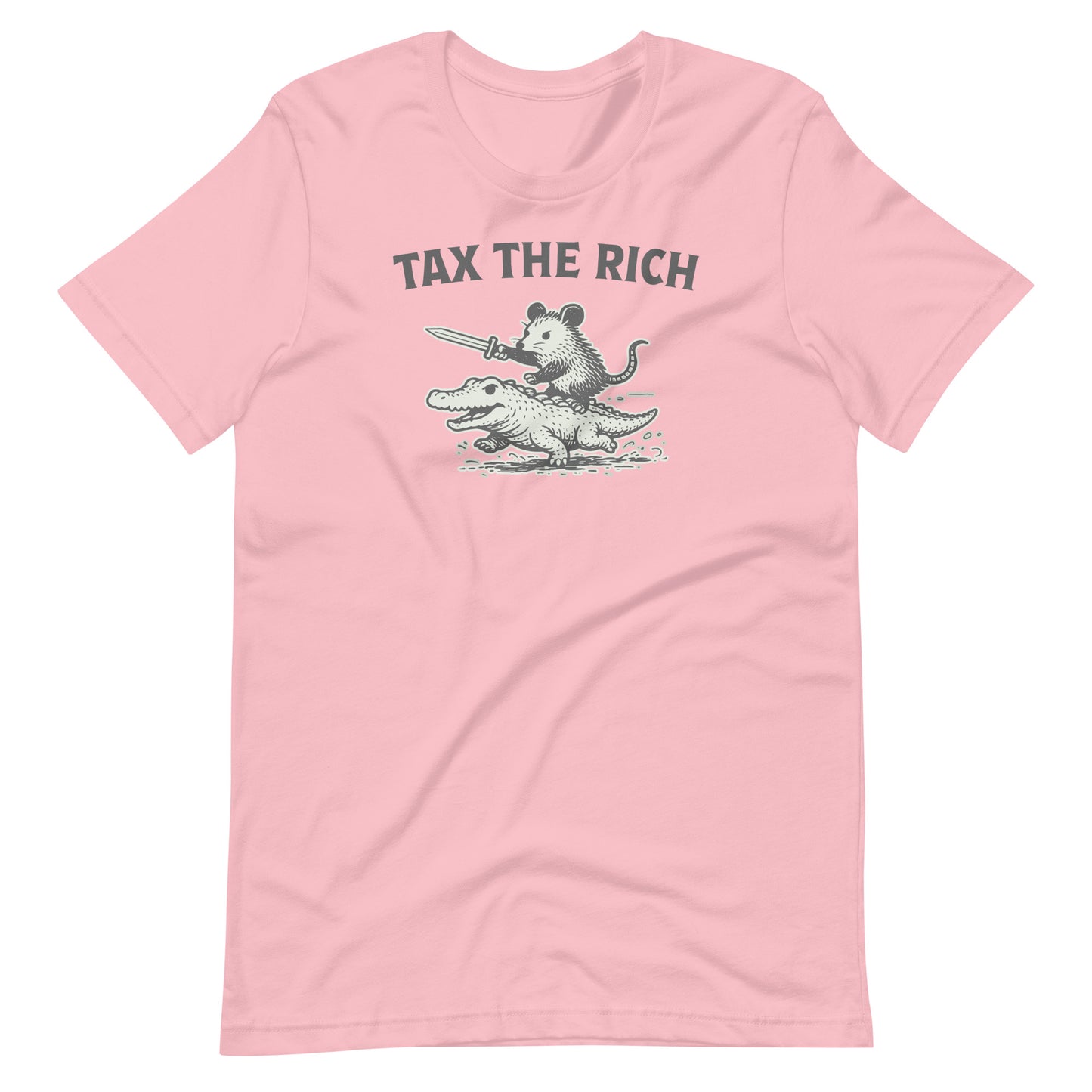 Pink unisex t-shirt featuring a vintage-inspired opossum riding an alligator illustration paired with the bold “Tax the Rich” statement.