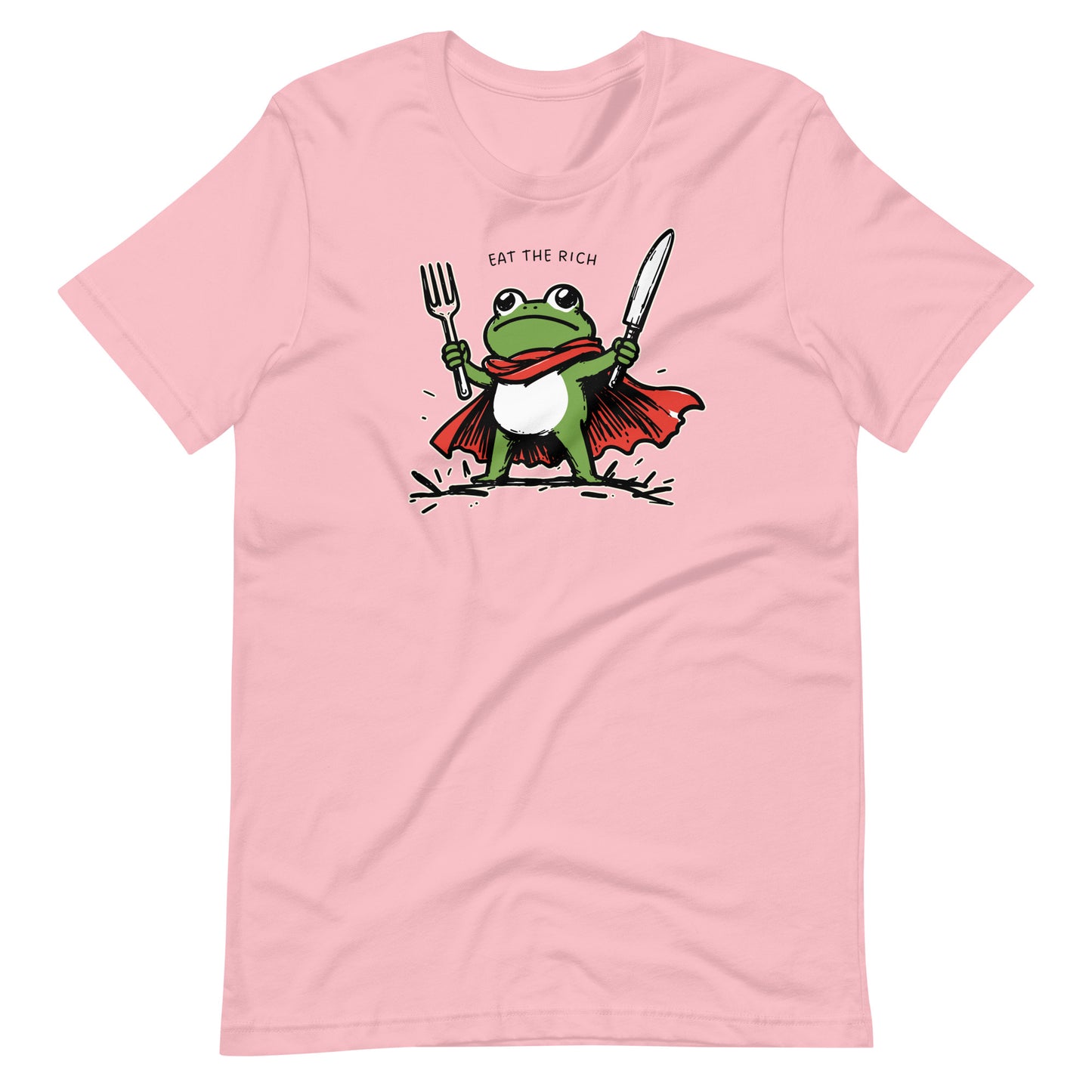 Pink unisex t-shirt displaying a caped frog character armed with fork and knife beneath the phrase “Eat the Rich” in a humorous protest-inspired design.