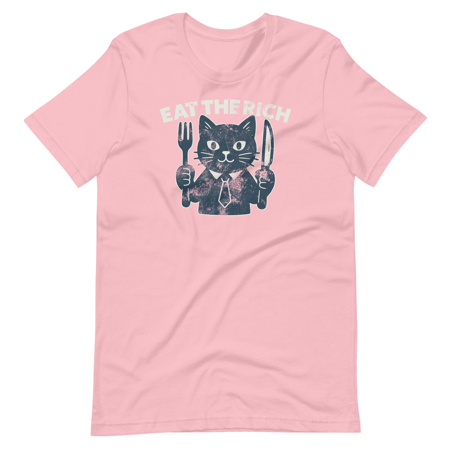 Pink unisex t-shirt featuring a cartoon cat holding a fork and knife with the bold “Eat the Rich” slogan and anti-corporate protest-inspired design.
