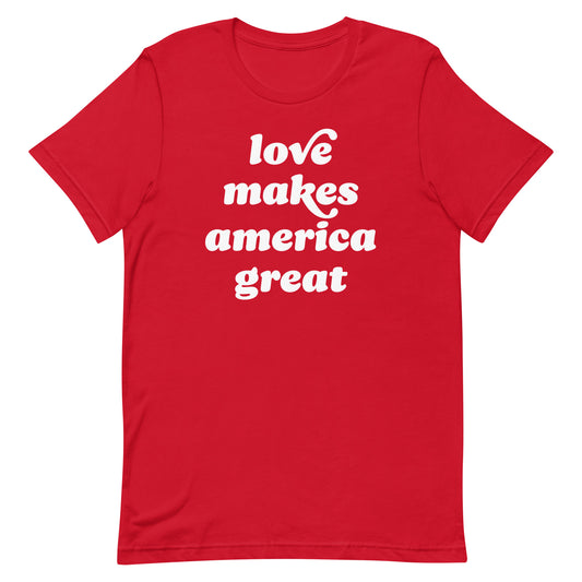 Red unisex t-shirt displaying the phrase “love makes america great,” blending patriotic color with progressive Valentine sentiment and justice-focused design for everyday wear.