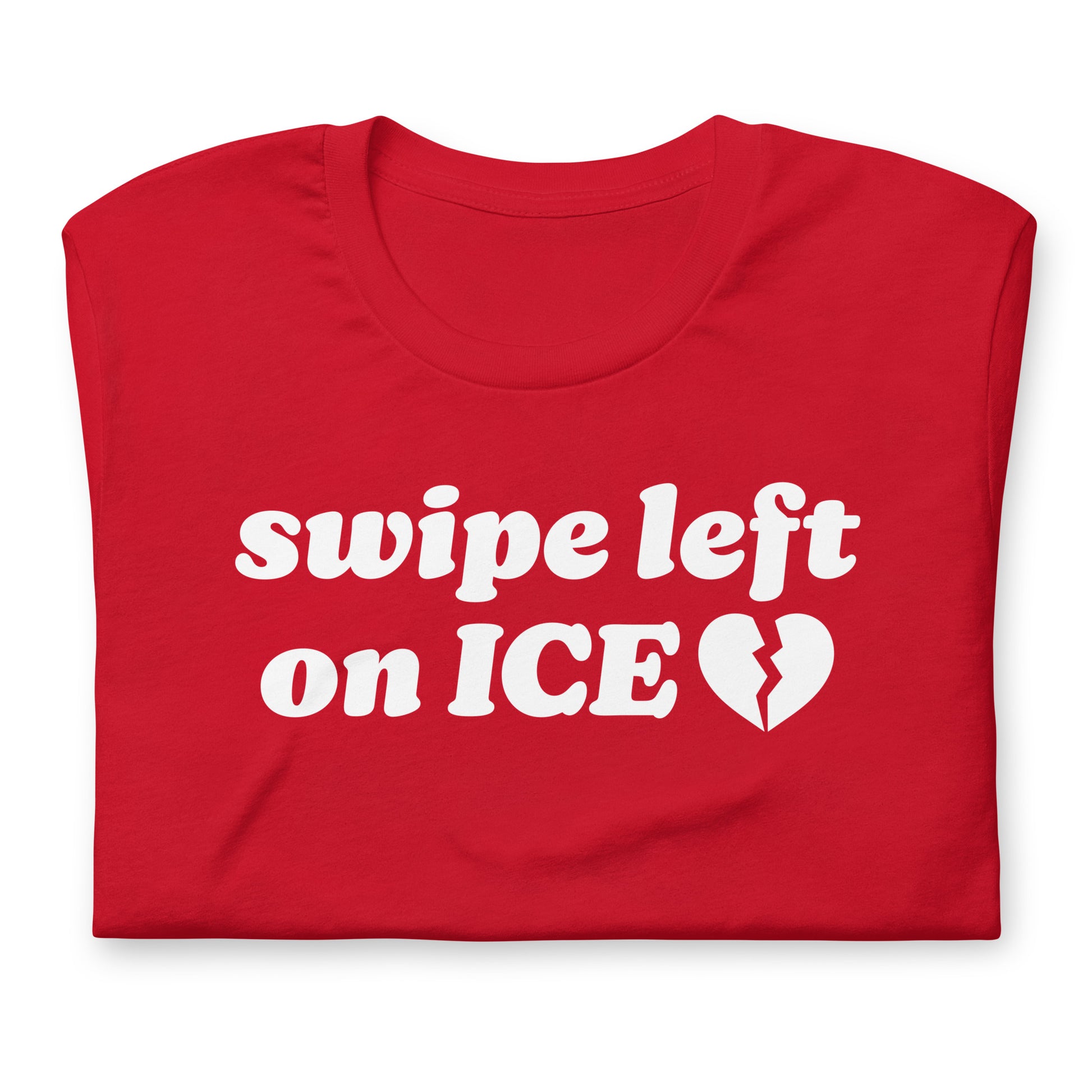 Folded red unisex t-shirt highlighting the phrase “swipe left on ICE,” emphasizing bold typography and Abolish ICE Valentine protest design.
