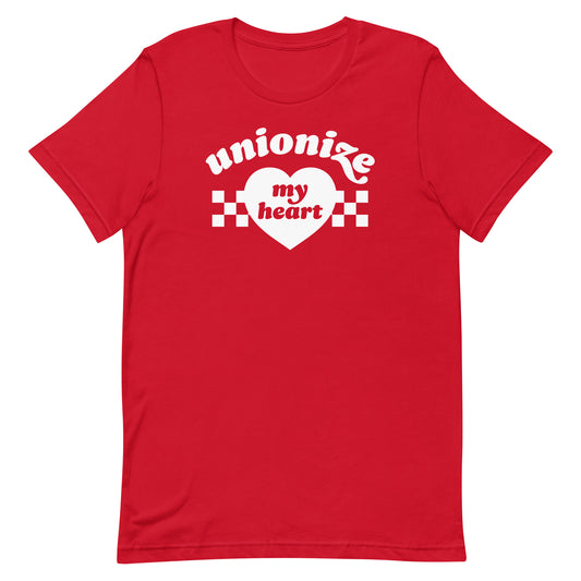 Red unisex t-shirt with “unionize my heart” phrase and heart motif, close-up flat lay highlighting union rights Valentine design and strong contrast typography.