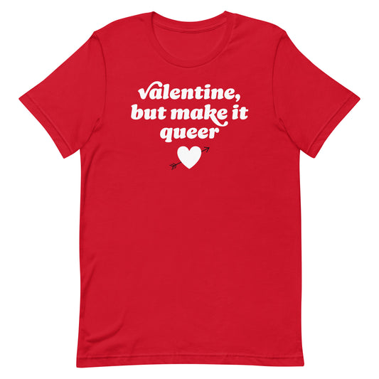 Red unisex t-shirt showing centered retro text and heart arrow artwork reading “Valentine, but make it queer,” an LGBTQ+ inclusive activist apparel piece.