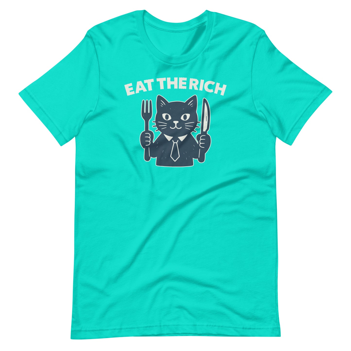 Teal t-shirt displaying a playful cat illustration with cutlery and the phrase “Eat the Rich,” blending political satire with cartoon-style artwork.