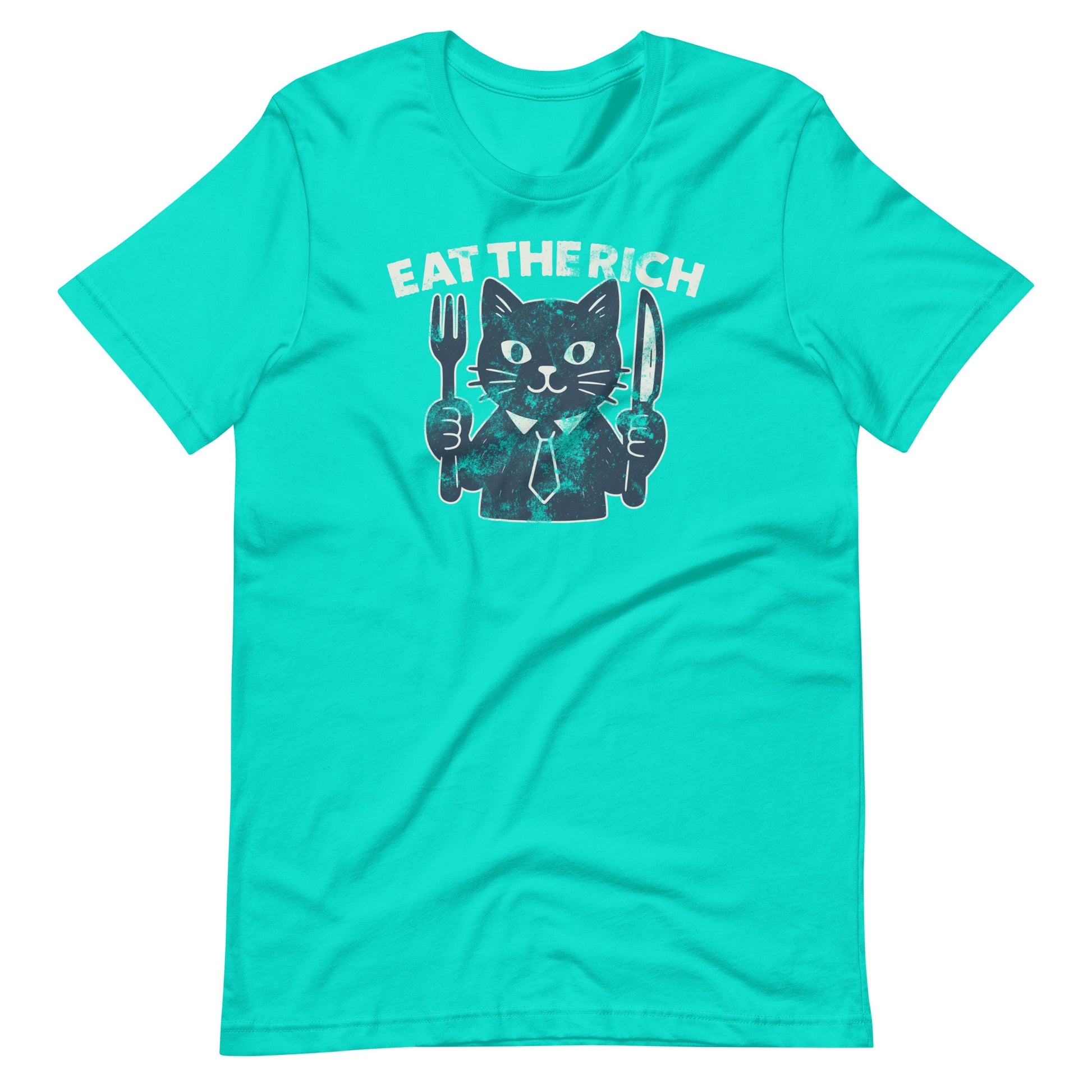 Teal t-shirt displaying a playful cat illustration with cutlery and the phrase “Eat the Rich,” blending political satire with cartoon-style artwork.