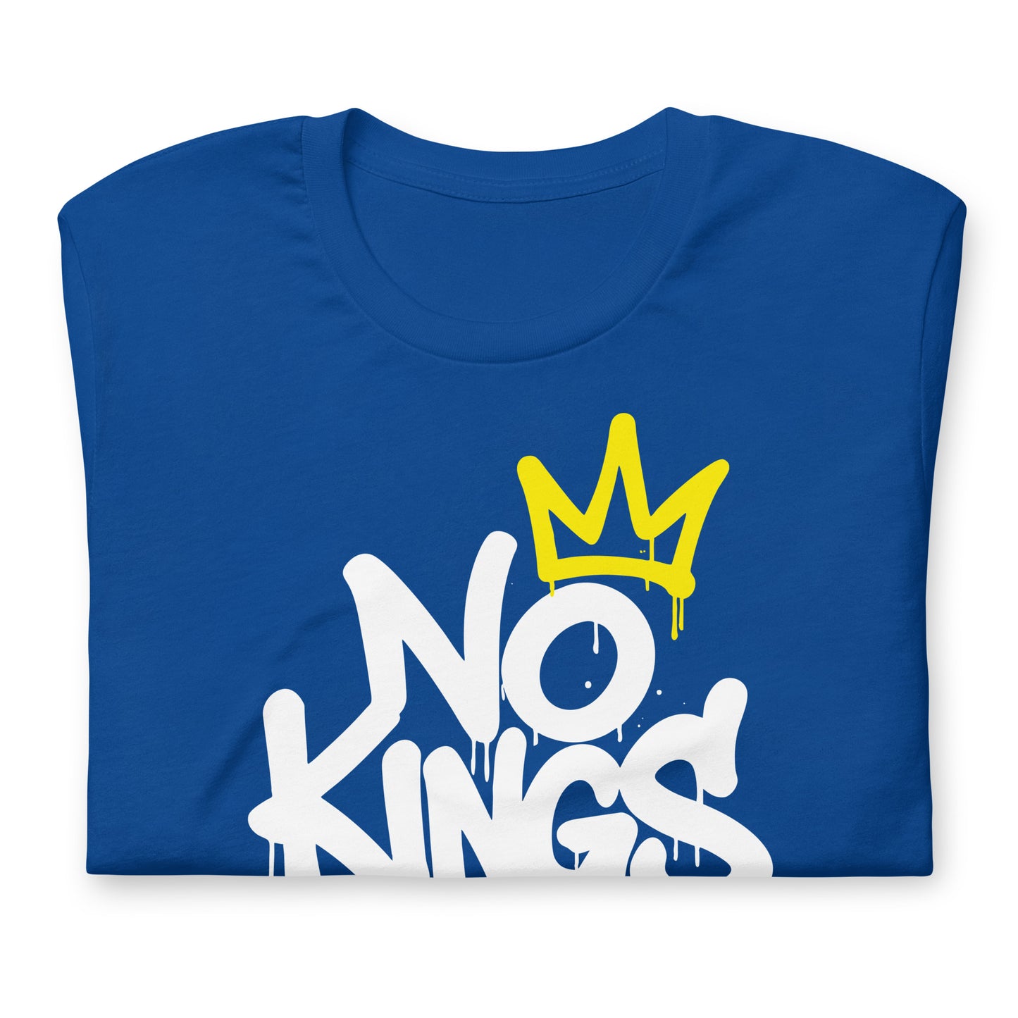Close-Up of Design: Close-up of dripping white “No Kings” text and yellow street-art style crown