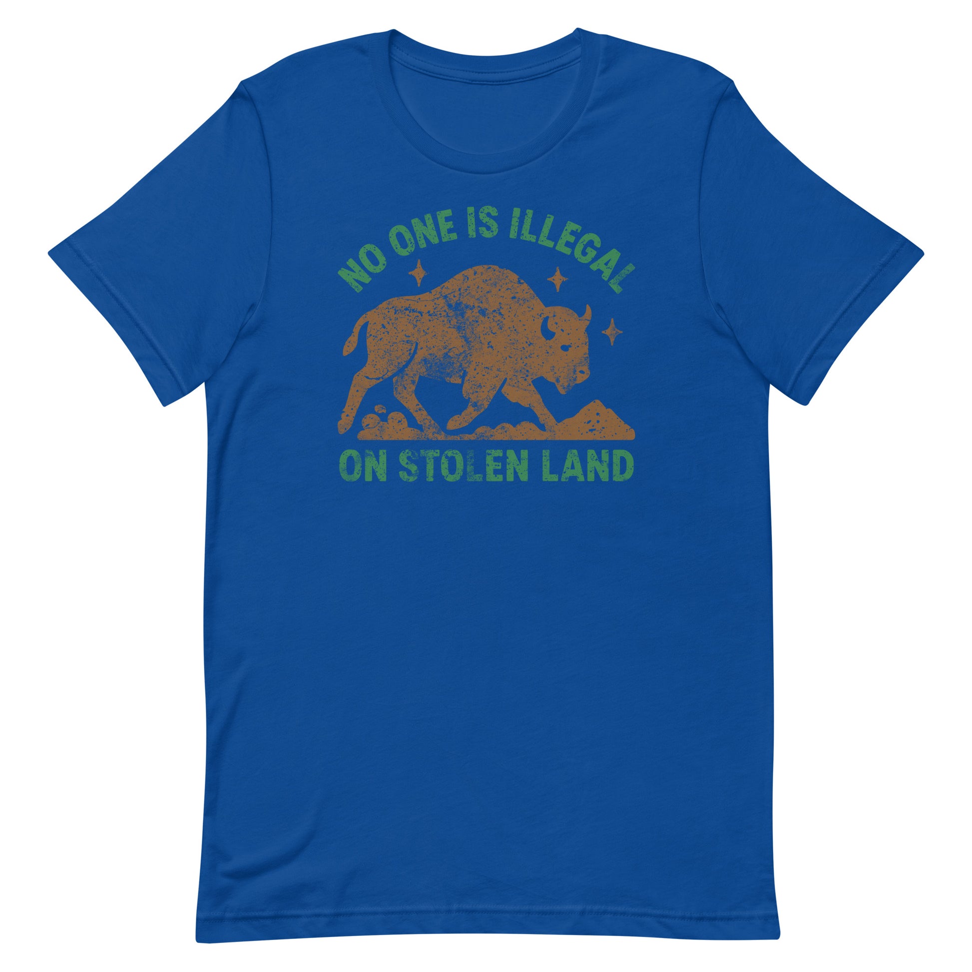 Royal blue unisex t-shirt featuring the buffalo emblem and the message “NO ONE IS ILLEGAL ON STOLEN LAND,” an expressive Indigenous justice-themed design.