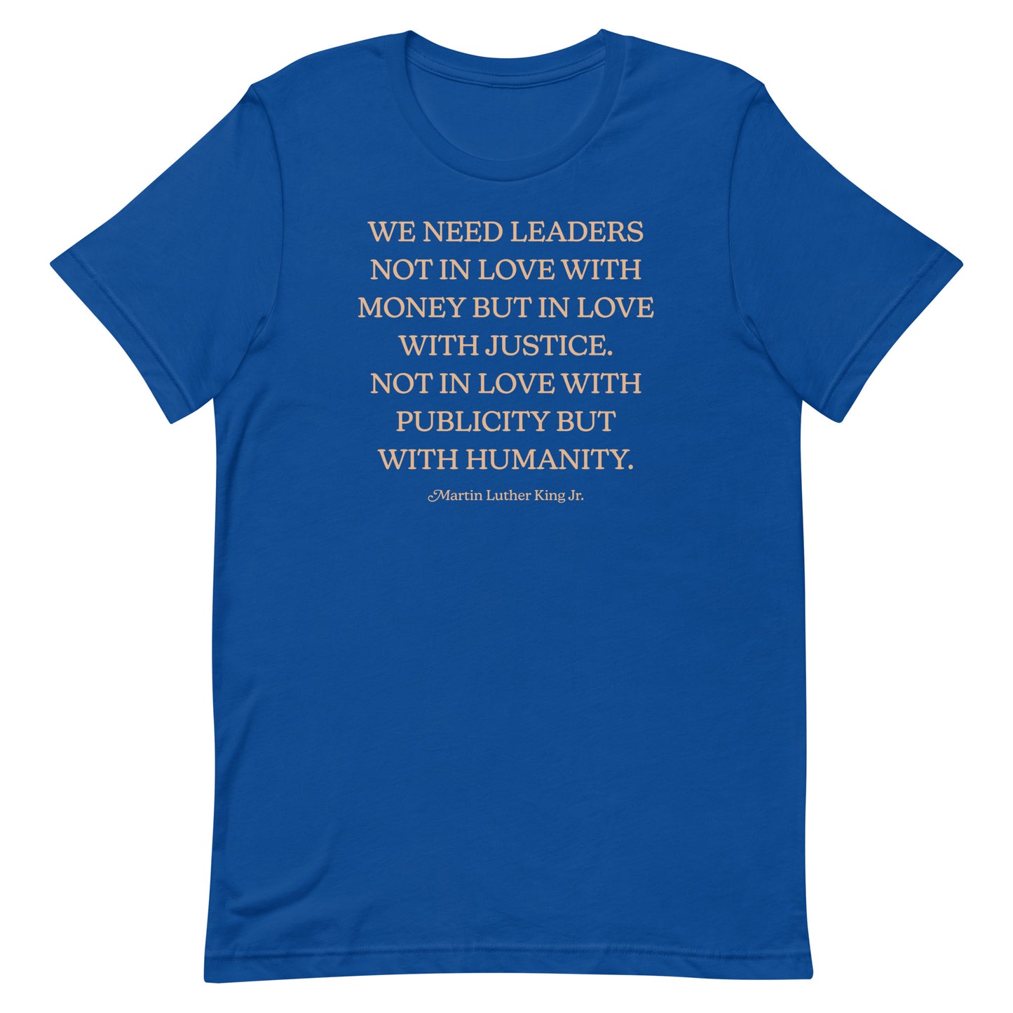 Royal blue shirt featuring MLK’s leadership quote in centered serif text. A clean activism-focused design promoting justice and humanity.