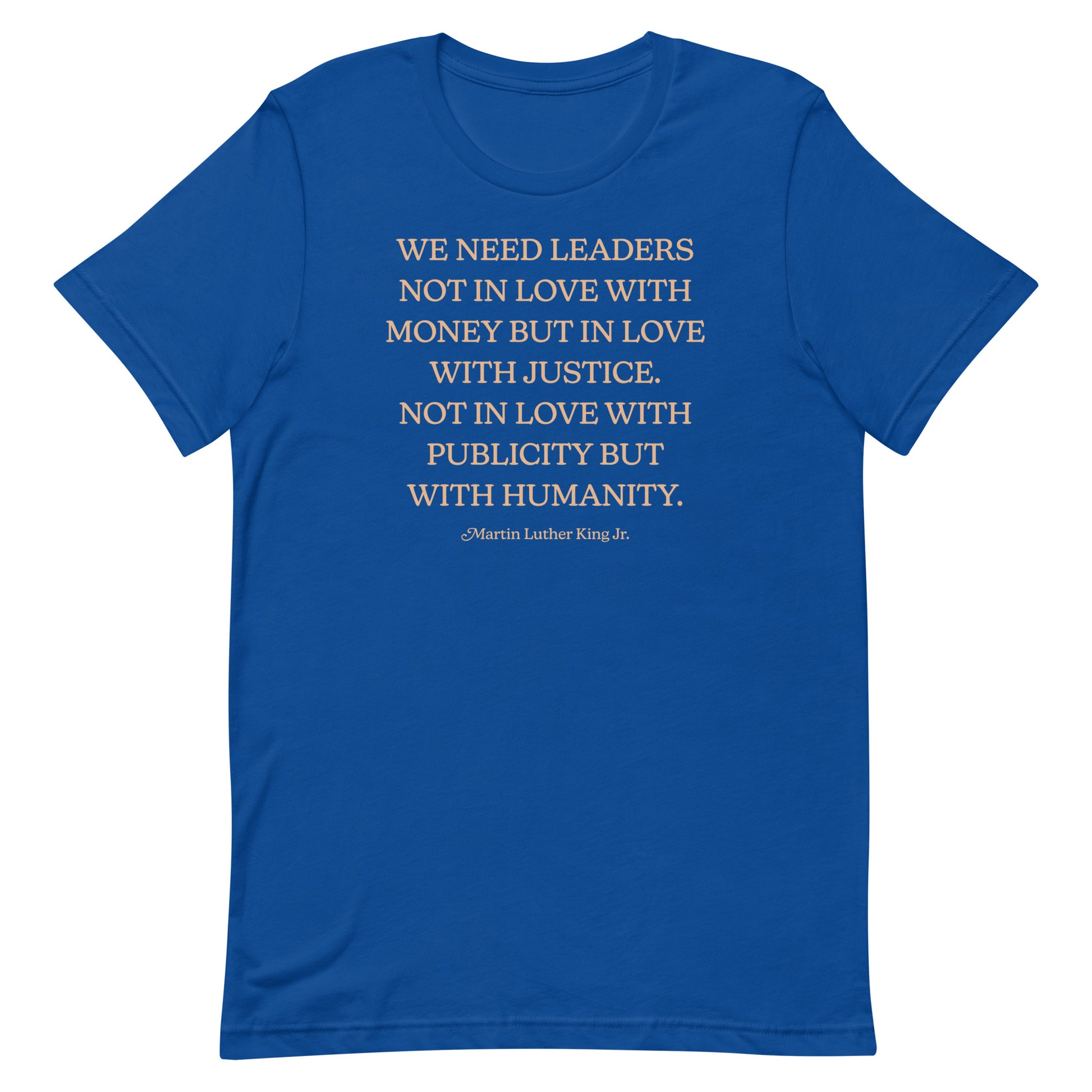 Royal blue shirt featuring MLK’s leadership quote in centered serif text. A clean activism-focused design promoting justice and humanity.