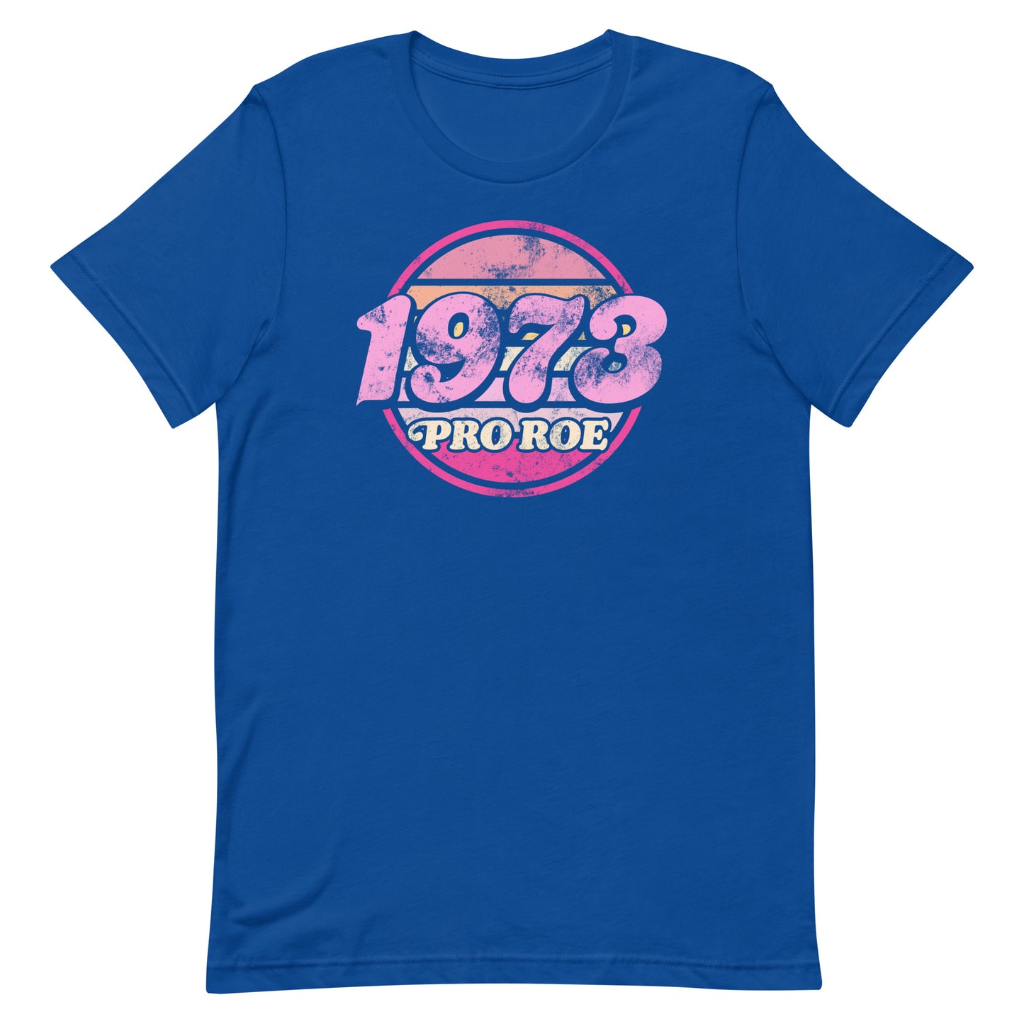 Royal blue unisex t-shirt with a vintage circular “1973 PRO ROE” emblem in pink, centered graphic printed on smooth blue fabric.
