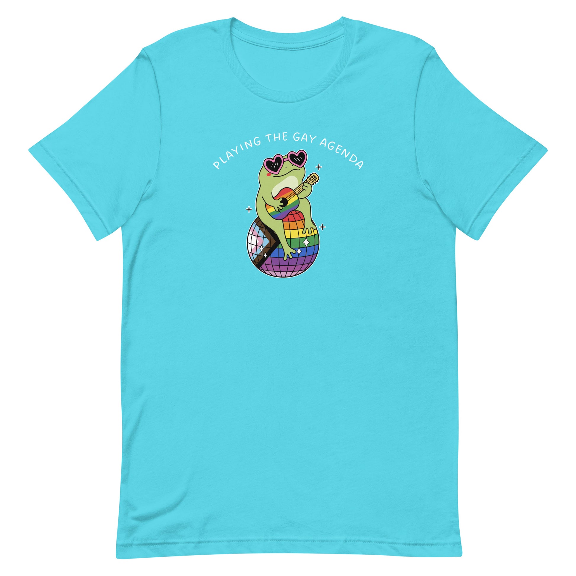 Turquoise pride t-shirt displaying a disco frog character with heart-shaped sunglasses, rainbow details, and playful LGBTQ+ pride-inspired artwork.