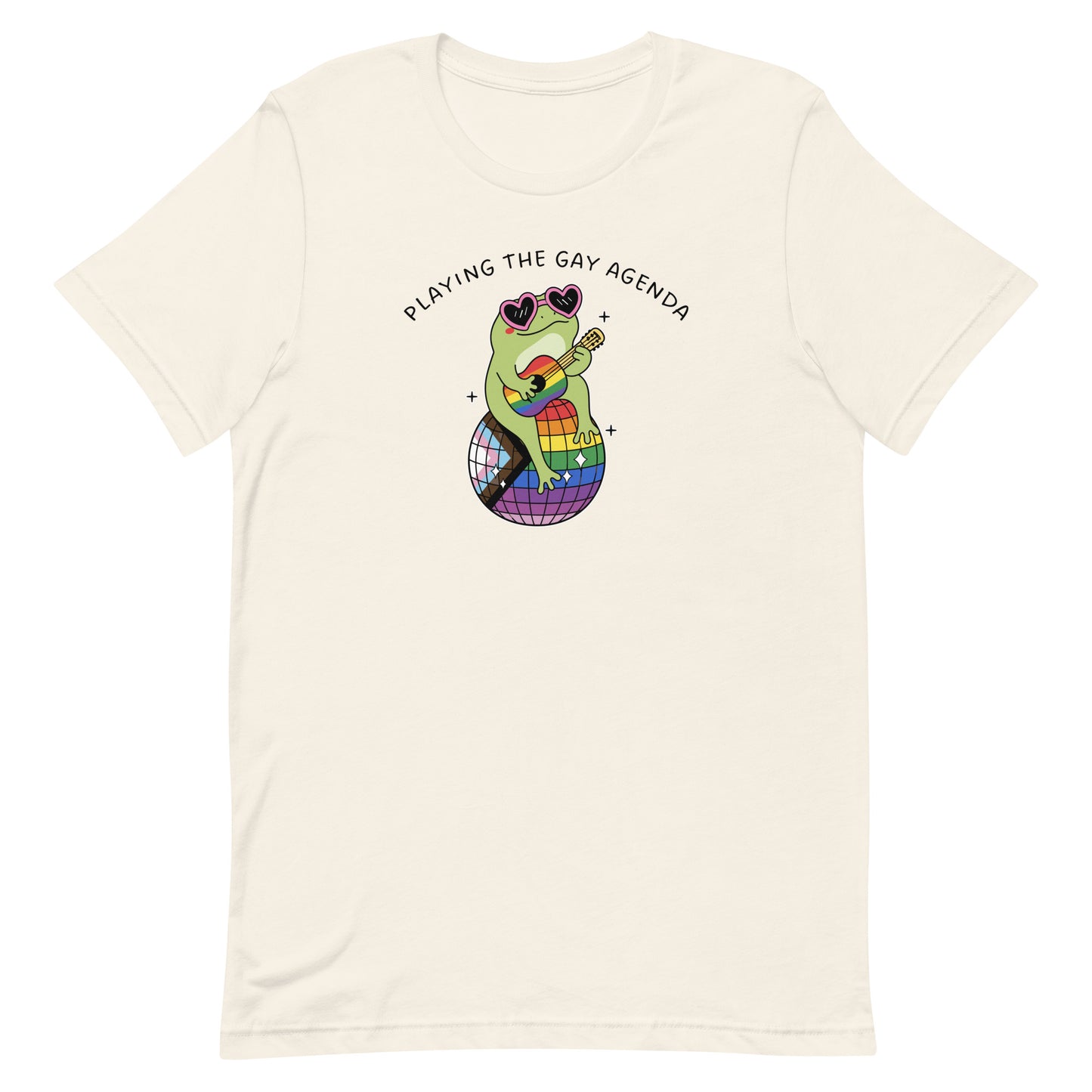 Vintage white unisex t-shirt featuring a disco frog seated on a rainbow disco ball with “Playing the Gay Agenda” text and colorful pride-themed design.