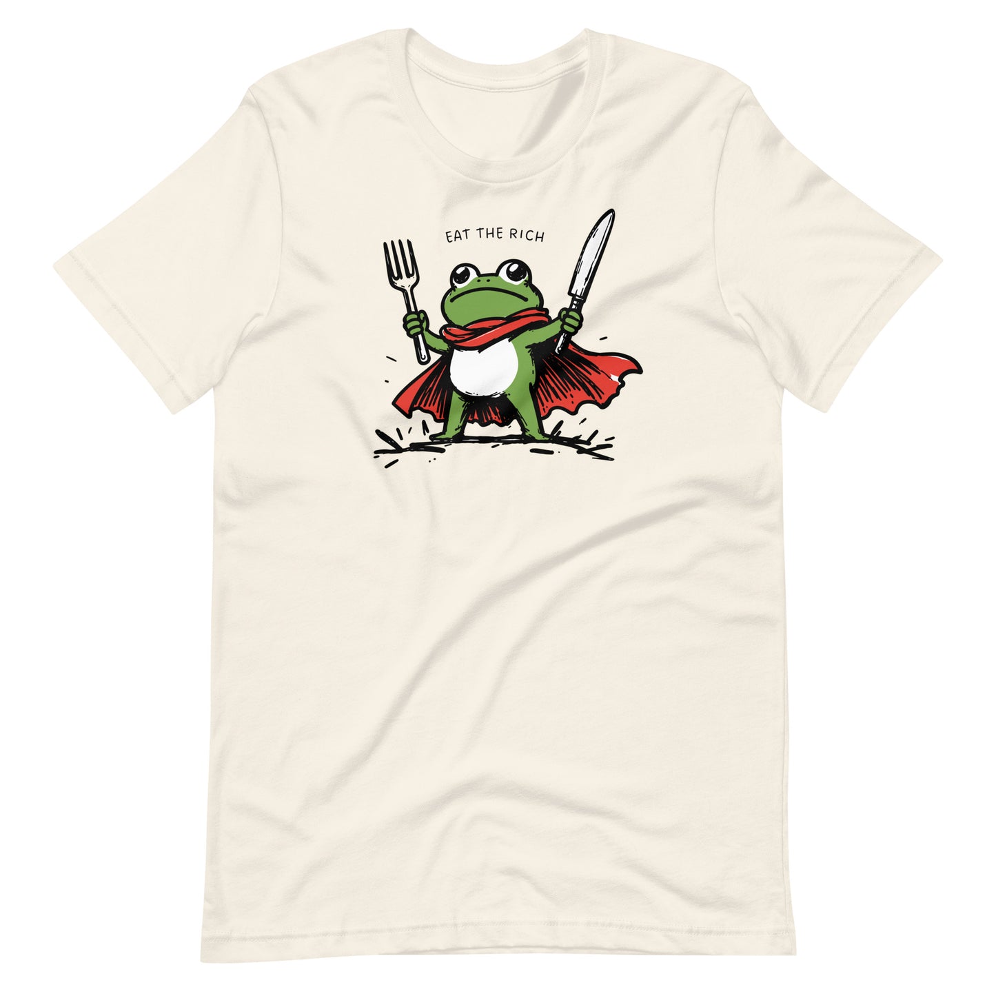 Vintage white t-shirt featuring a cartoon frog hero with cape, fork, and knife artwork paired with the bold “Eat the Rich” anti-corporate slogan.