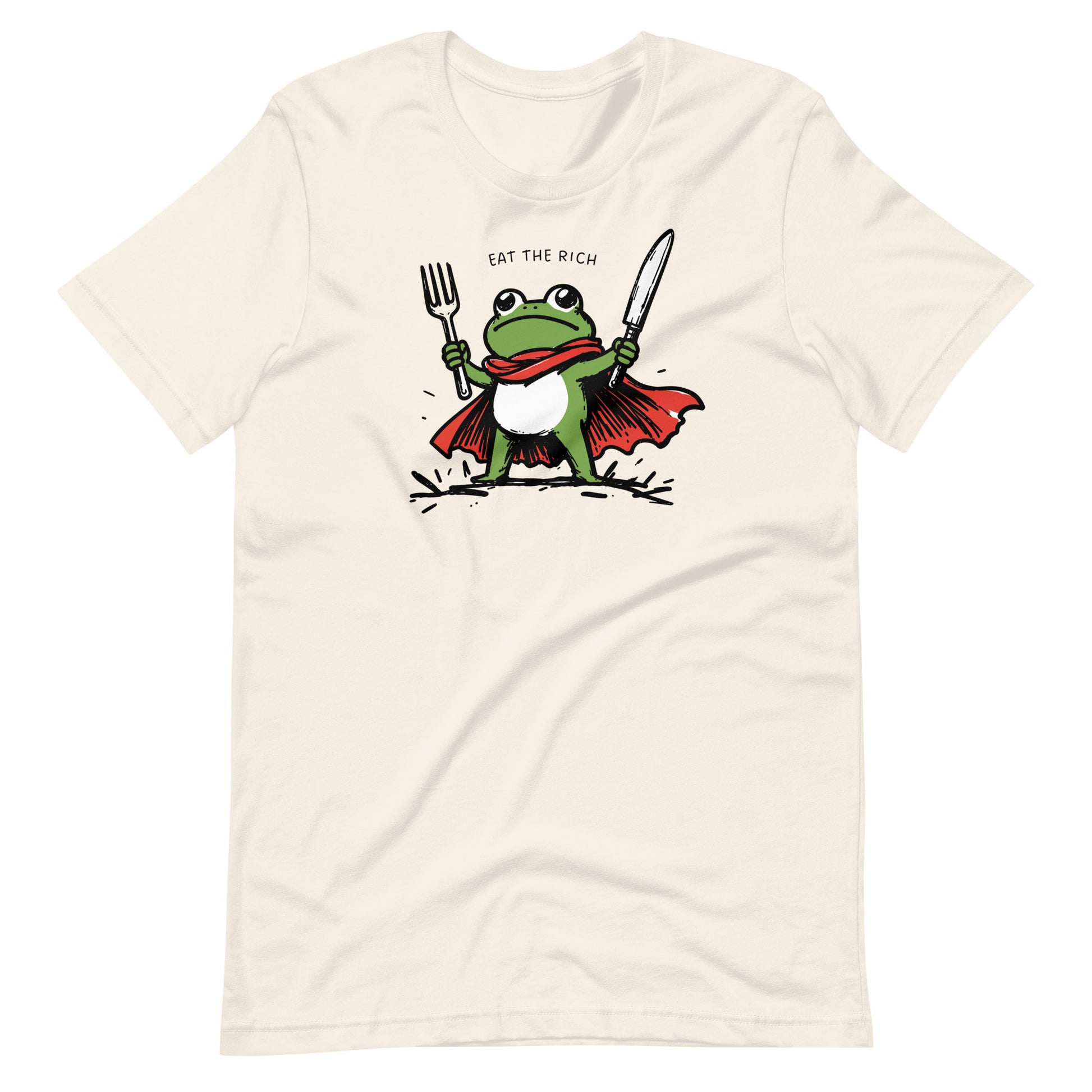 Vintage white t-shirt featuring a cartoon frog hero with cape, fork, and knife artwork paired with the bold “Eat the Rich” anti-corporate slogan.
