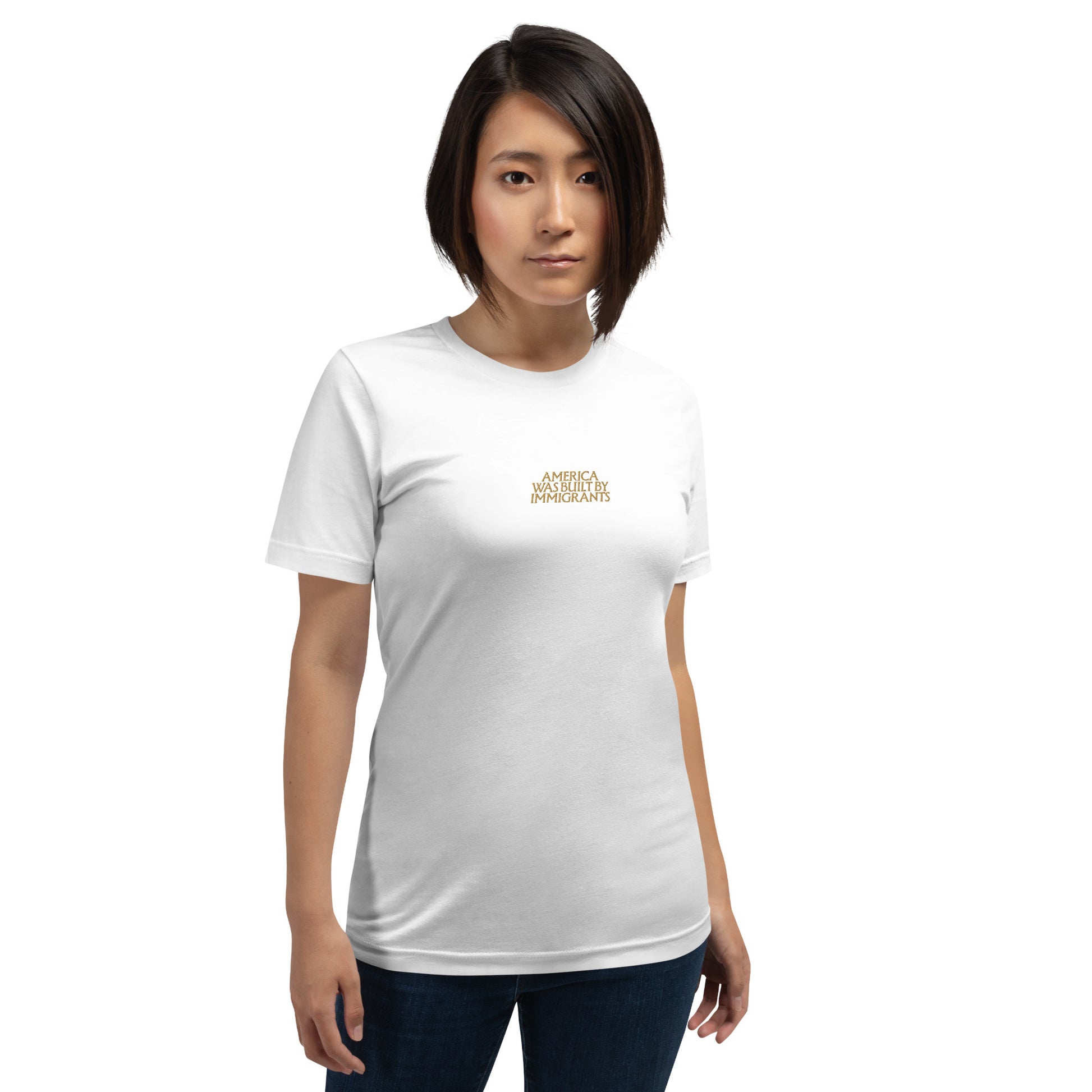Asian woman wearing the "America Was Built By Immigrants" Pro-Immigrant Embroidered Unisex T-Shirt