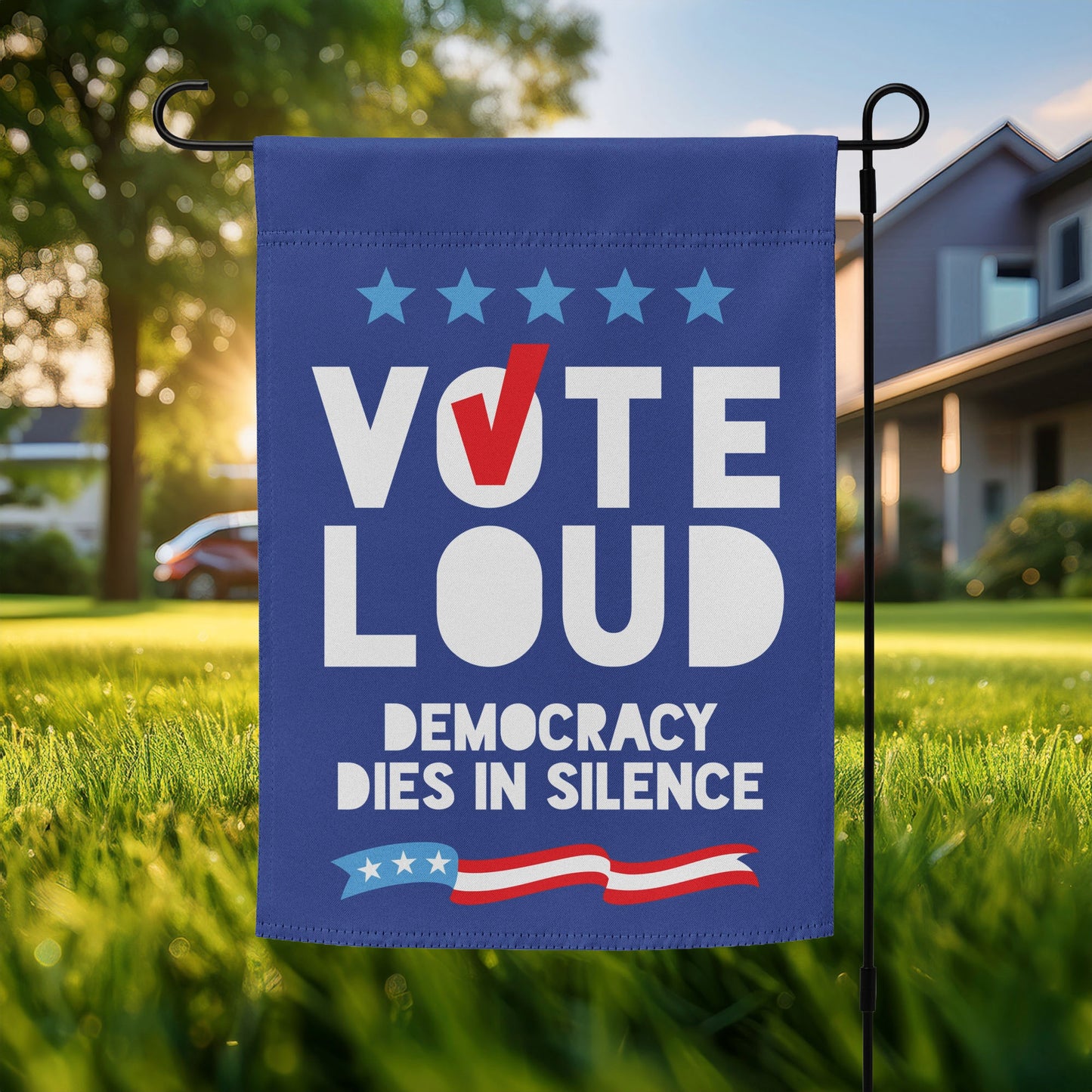 Blue garden flag featuring bold “VOTE LOUD” text with “DEMOCRACY DIES IN SILENCE” below, patriotic pro-democracy outdoor decor with stars and flag stripe graphic.