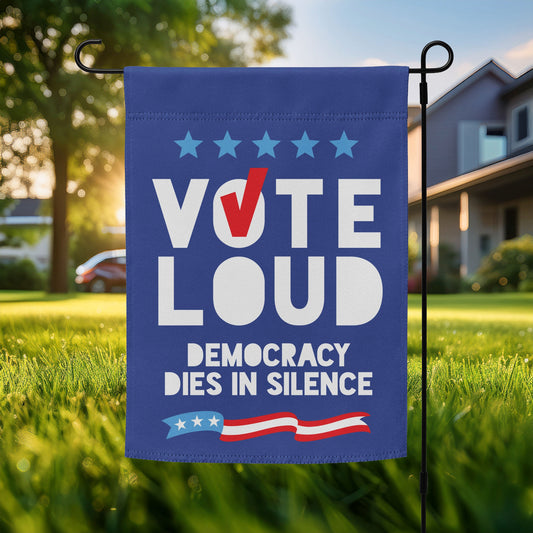 Blue garden flag featuring bold “VOTE LOUD” text with “DEMOCRACY DIES IN SILENCE” below, patriotic pro-democracy outdoor decor with stars and flag stripe graphic.