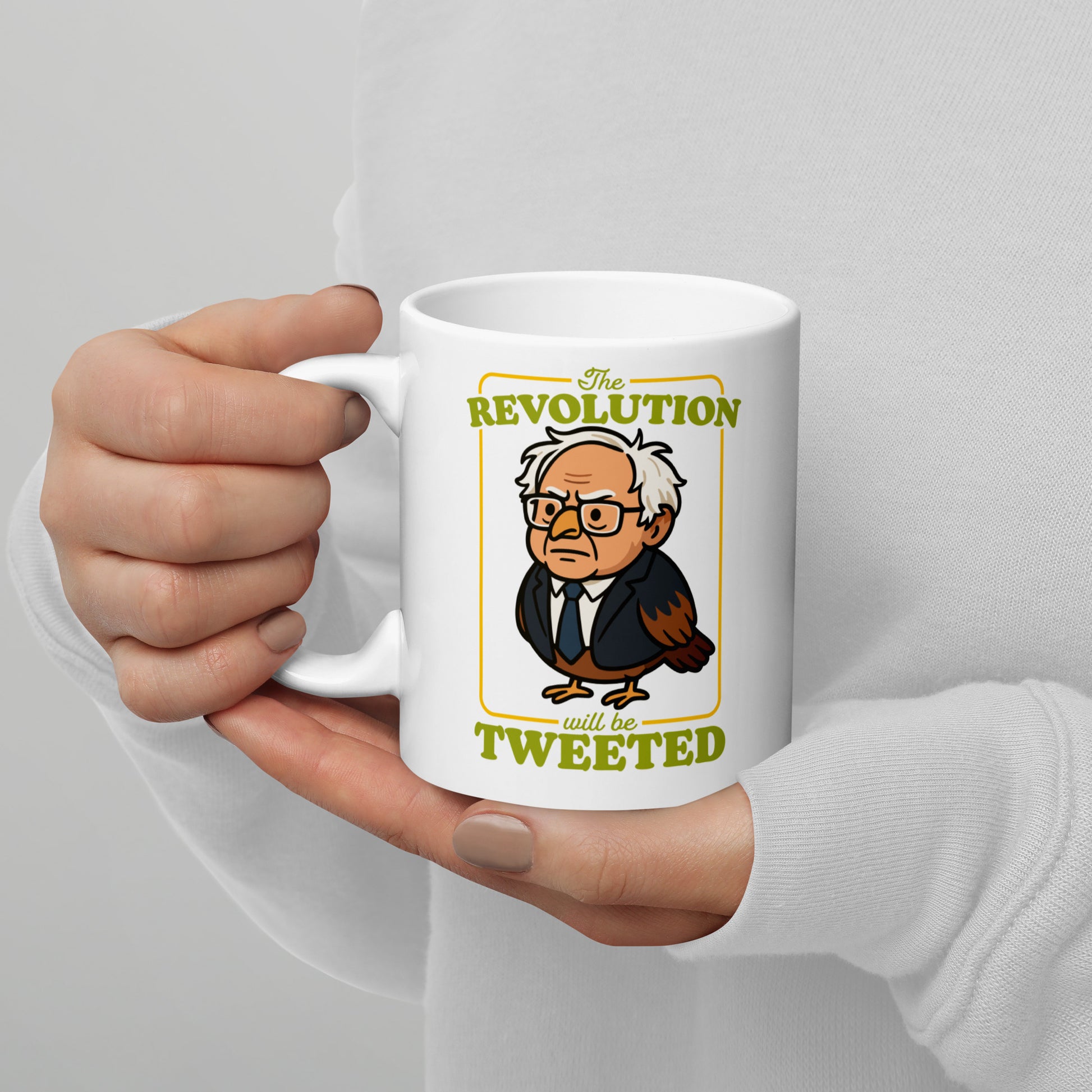 Blue Wave USA ceramic mug held in hand, displaying Birdie Sanders illustration with vintage revolution poster styling and tweeted slogan.