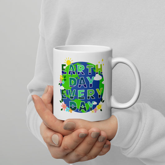 Lifestyle Image: Person holding the white 11 oz Make Every Day Earth Day Mug, promoting environmental awareness with every sip.