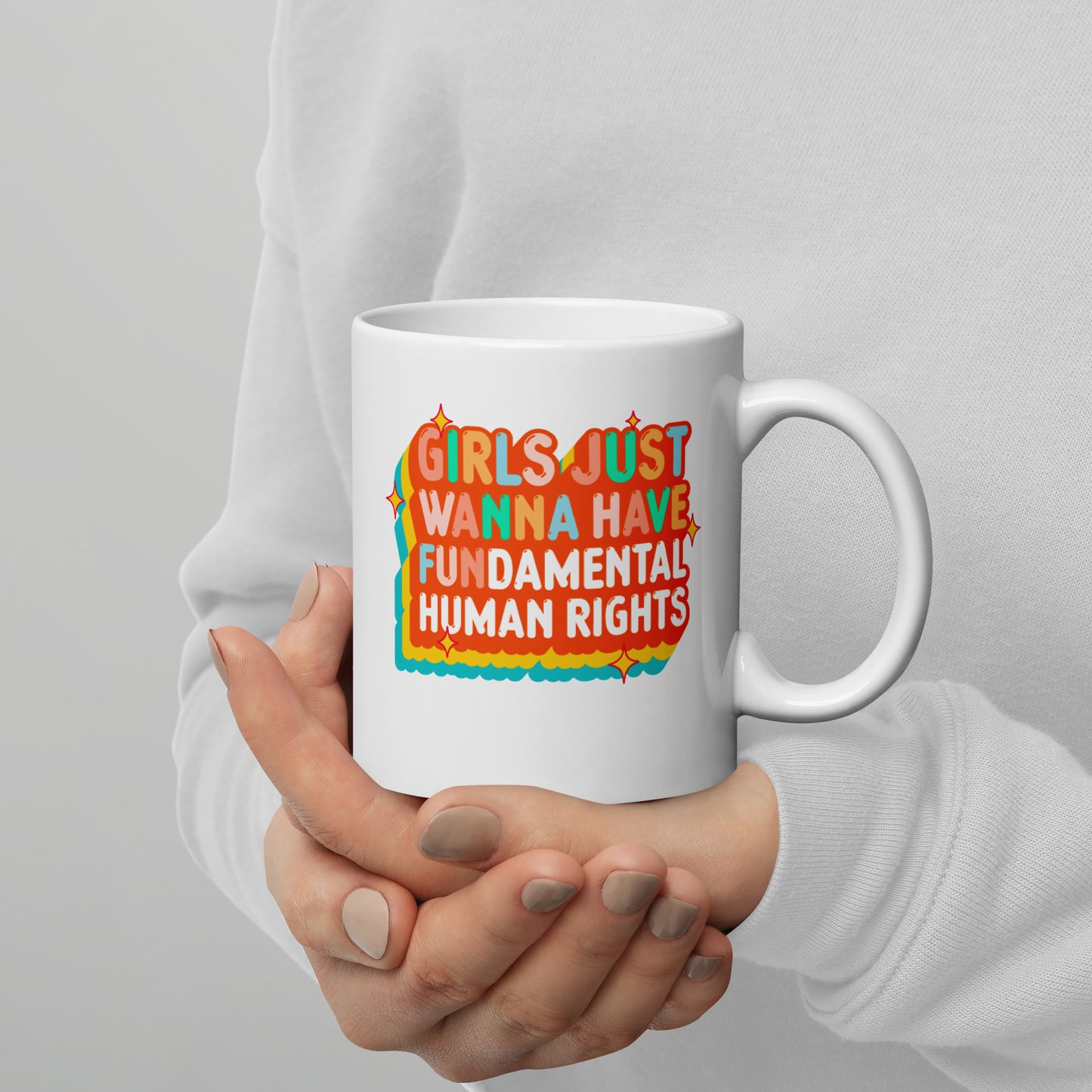 11 oz white mug featuring the retro sunset “Girls Just Wanna Have Fundamental Human Rights” design, progressive drinkware by Blue Wave USA.