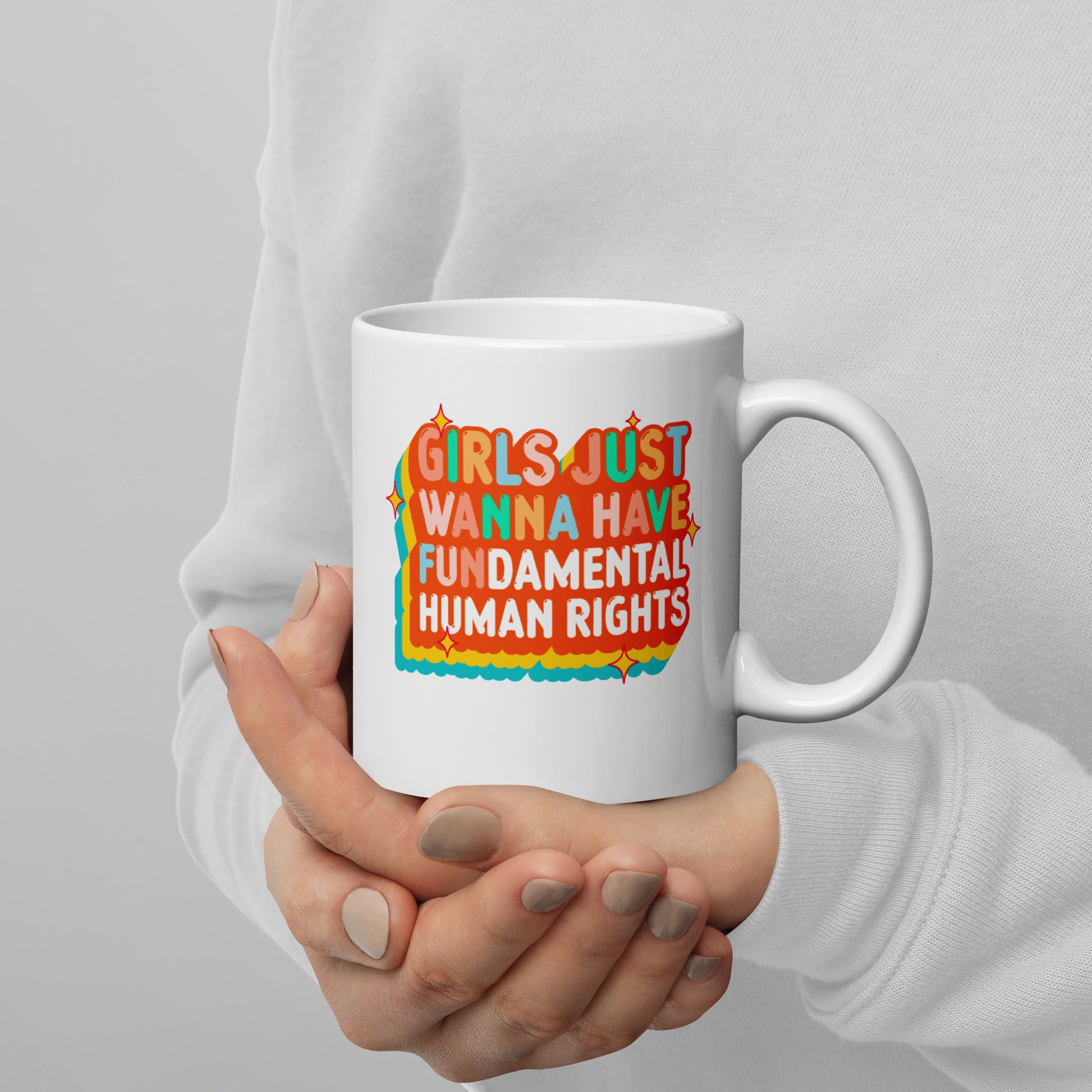 11 oz white mug featuring the retro sunset “Girls Just Wanna Have Fundamental Human Rights” design, progressive drinkware by Blue Wave USA.