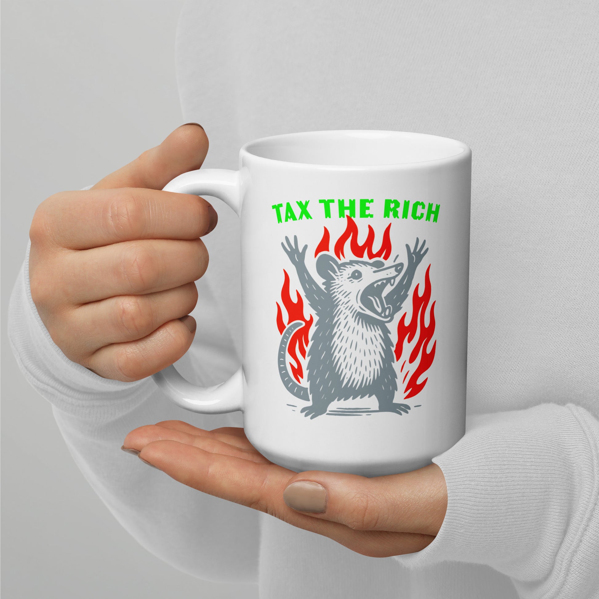 Front View Image: Tax The Rich Opossum 15 oz White Mug – protest graphic with flames and bold text