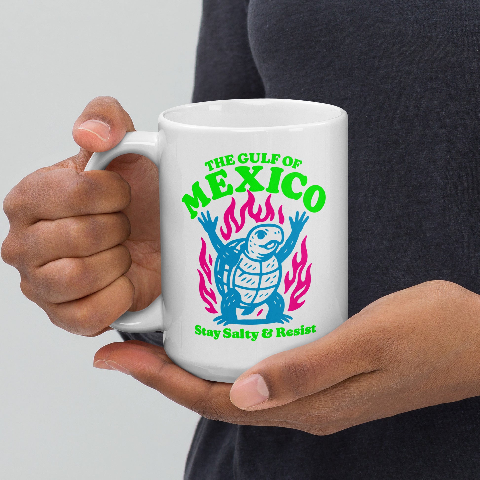 Front View Image: “Front view of 15 oz white ceramic mug featuring sea turtle and 'Stay Salty & Resist' slogan”
