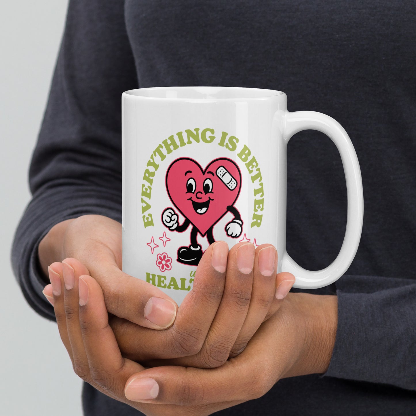 The 15 oz “Everything Is Better with Healthcare” mug showing the vibrant heart illustration and clean ceramic finish. Created by Blue Wave USA.