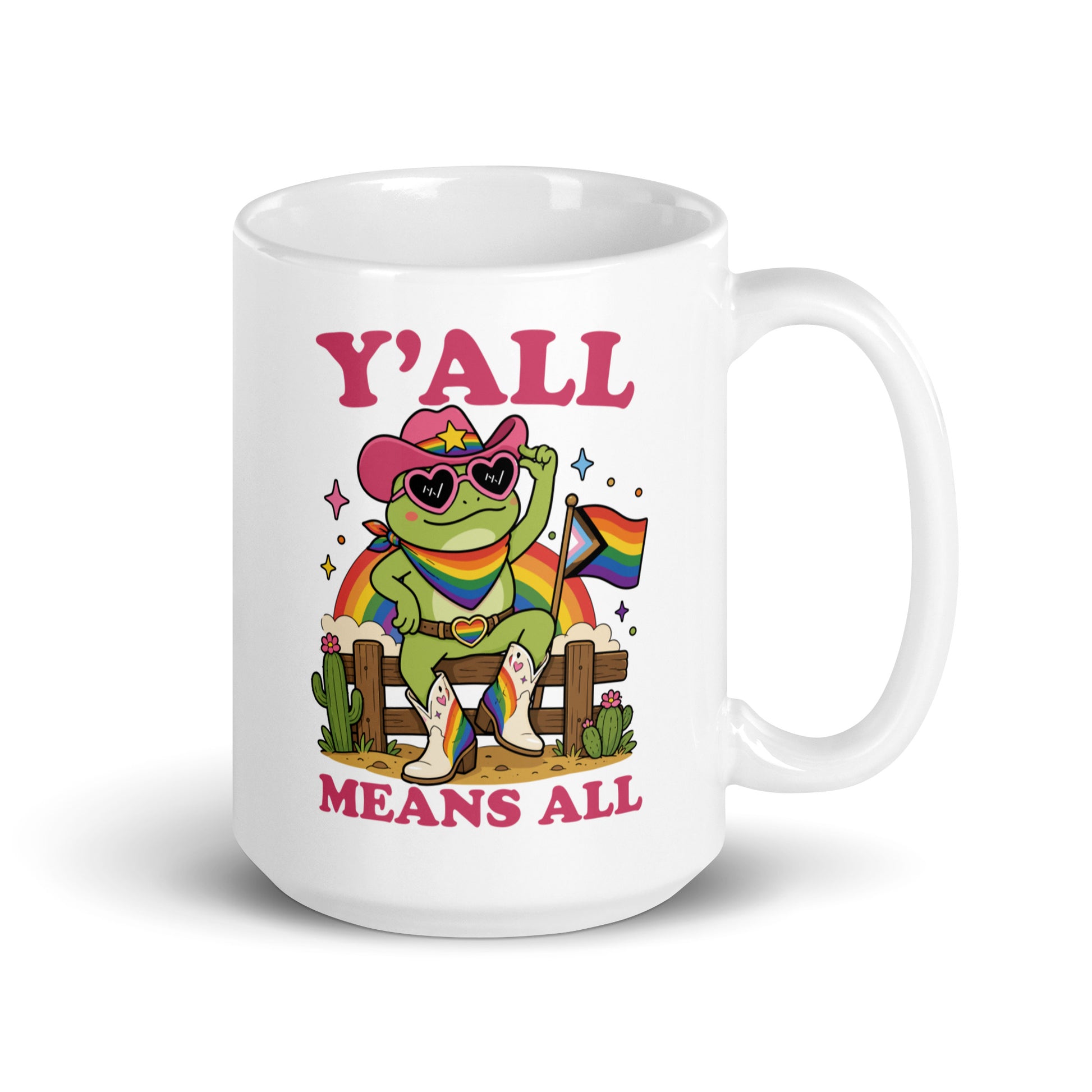 White glossy mug showcasing a rainbow cowboy frog in western-inspired attire with pride flag accents and welcoming “Y’All Means All” design.