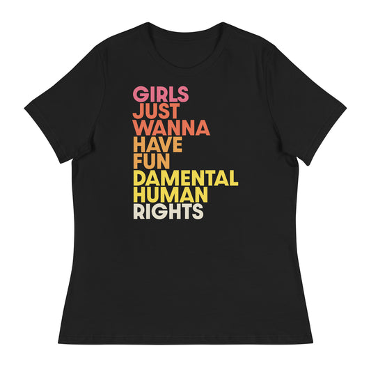 Black women’s relaxed fit t-shirt with colorful stacked text reading “Girls Just Wanna Have Fundamental Human Rights,” bold feminist design.