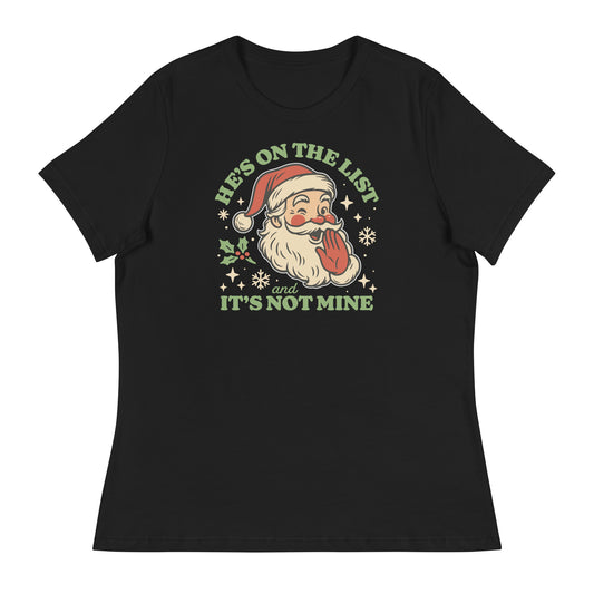Women’s black fitted t-shirt featuring a vintage Santa illustration with a cheeky expression and the text “He’s On the List & It’s Not Mine,” surrounded by retro snowflakes.
