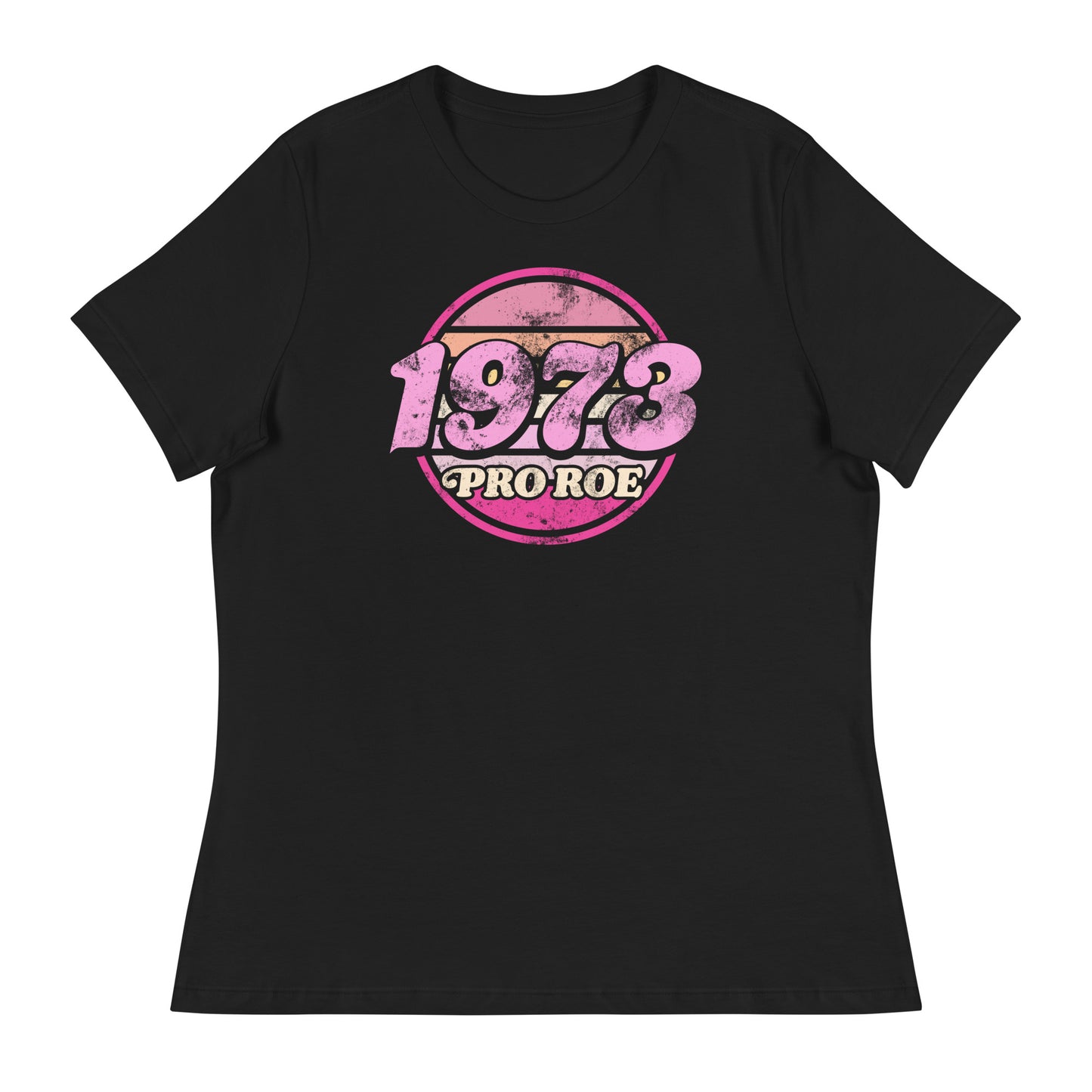 Black women’s relaxed t-shirt displayed flat, featuring a distressed circular badge reading “1973 PRO ROE,” vintage feminist protest graphic centered on the chest.