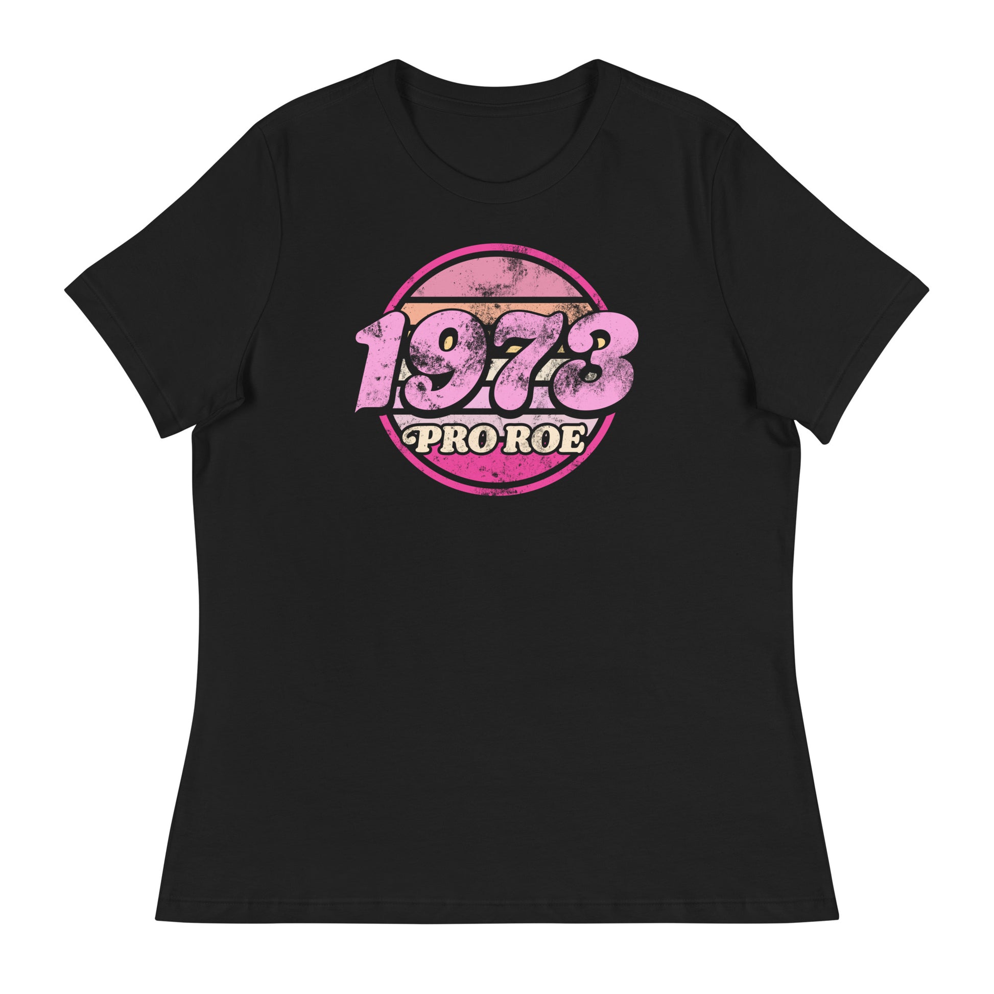 Black women’s relaxed t-shirt displayed flat, featuring a distressed circular badge reading “1973 PRO ROE,” vintage feminist protest graphic centered on the chest.
