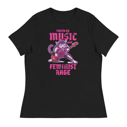 Black women’s relaxed t-shirt featuring a punk rock cat playing electric guitar with bold gothic lettering reading “FUELED BY MUSIC AND FEMINIST RAGE,” vibrant purple and pink graphic centered.