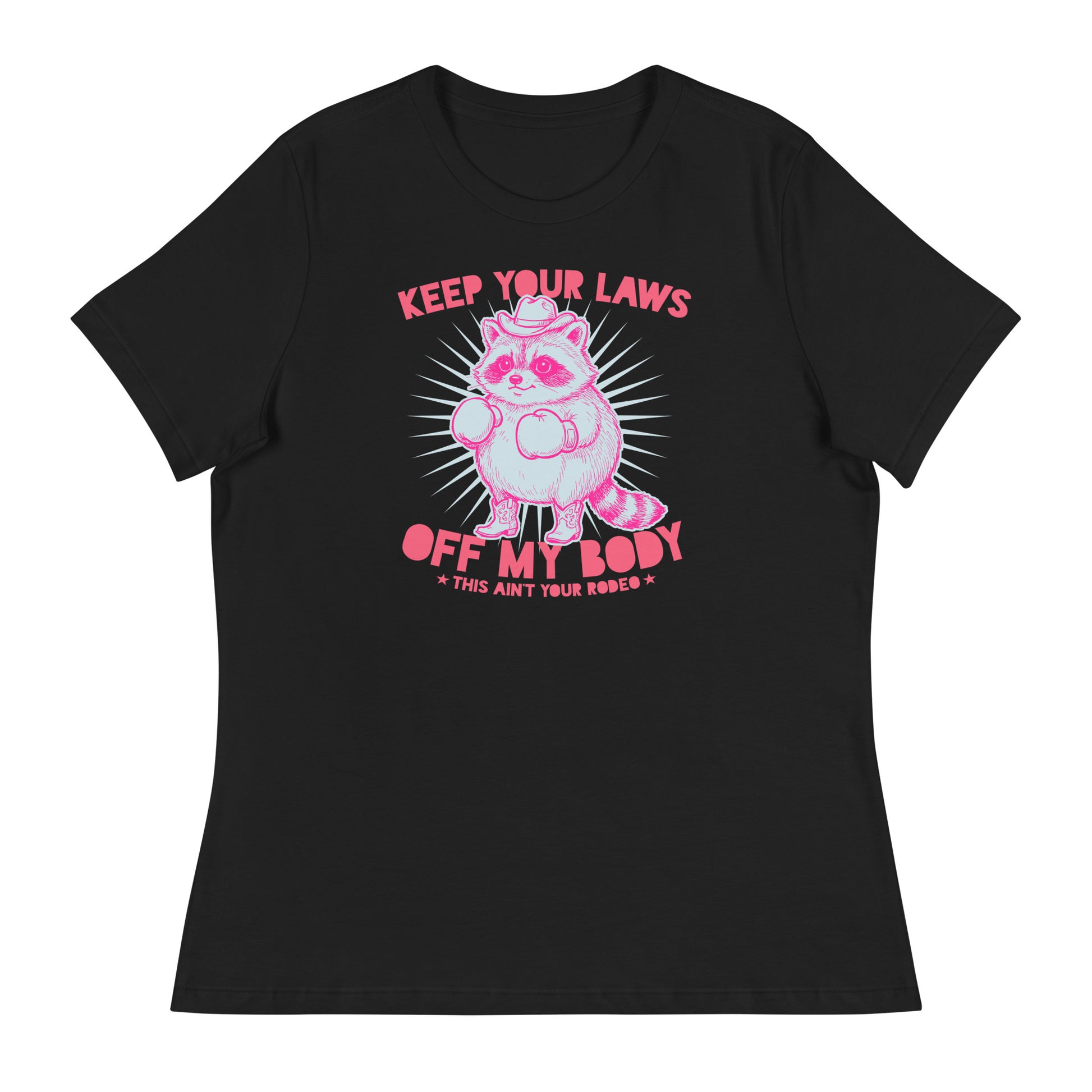Black women’s relaxed tee displaying cowboy raccoon illustration with “Keep Your Laws” wording in western feminist activist design.