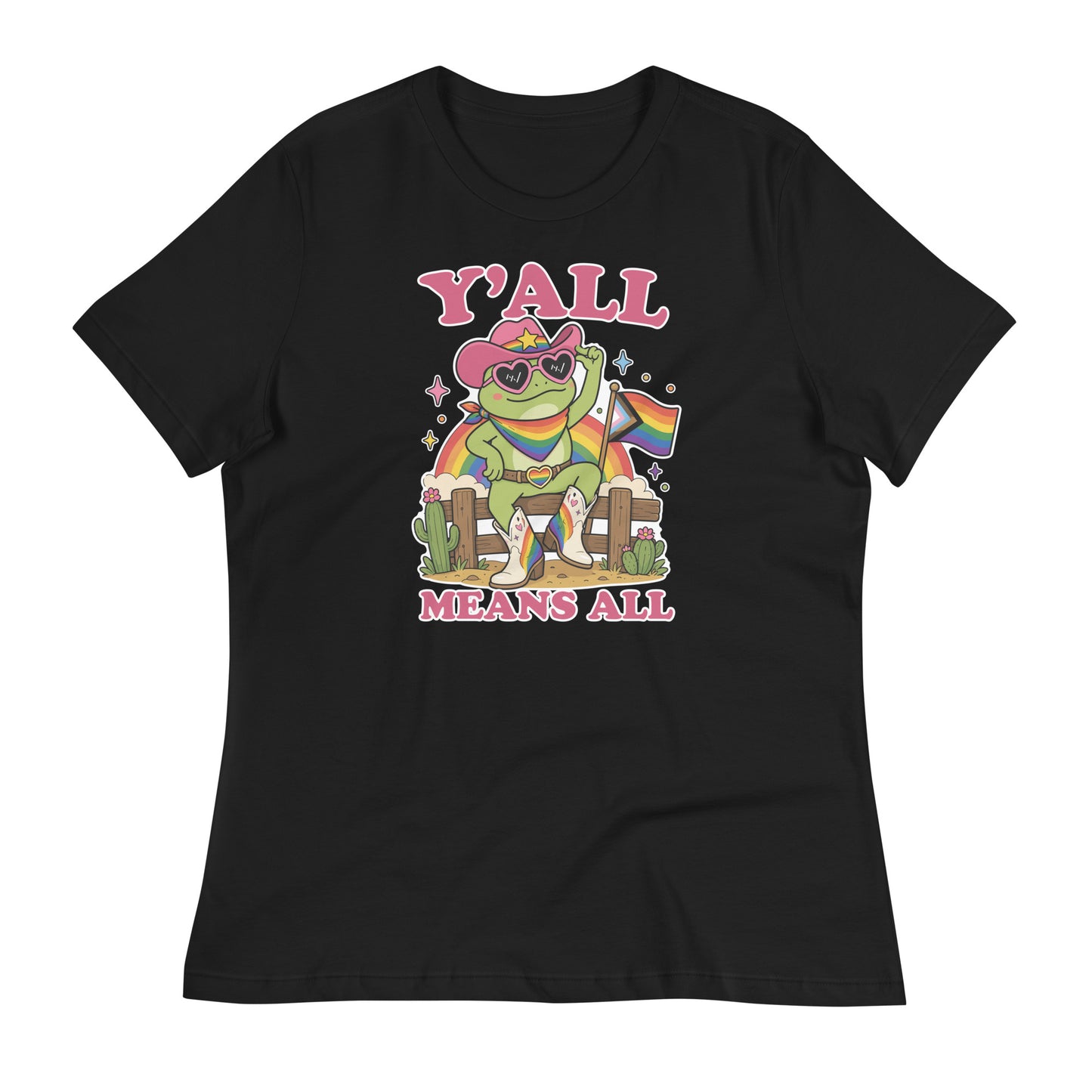 Black women’s relaxed t-shirt featuring a rainbow cowboy frog in heart-shaped sunglasses holding a pride flag with bold “Y’All Means All” LGBTQ+ pride artwork.