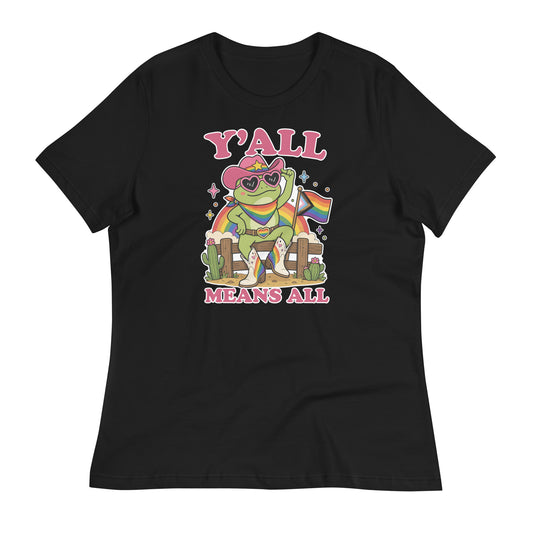Black women’s relaxed t-shirt featuring a rainbow cowboy frog in heart-shaped sunglasses holding a pride flag with bold “Y’All Means All” LGBTQ+ pride artwork.