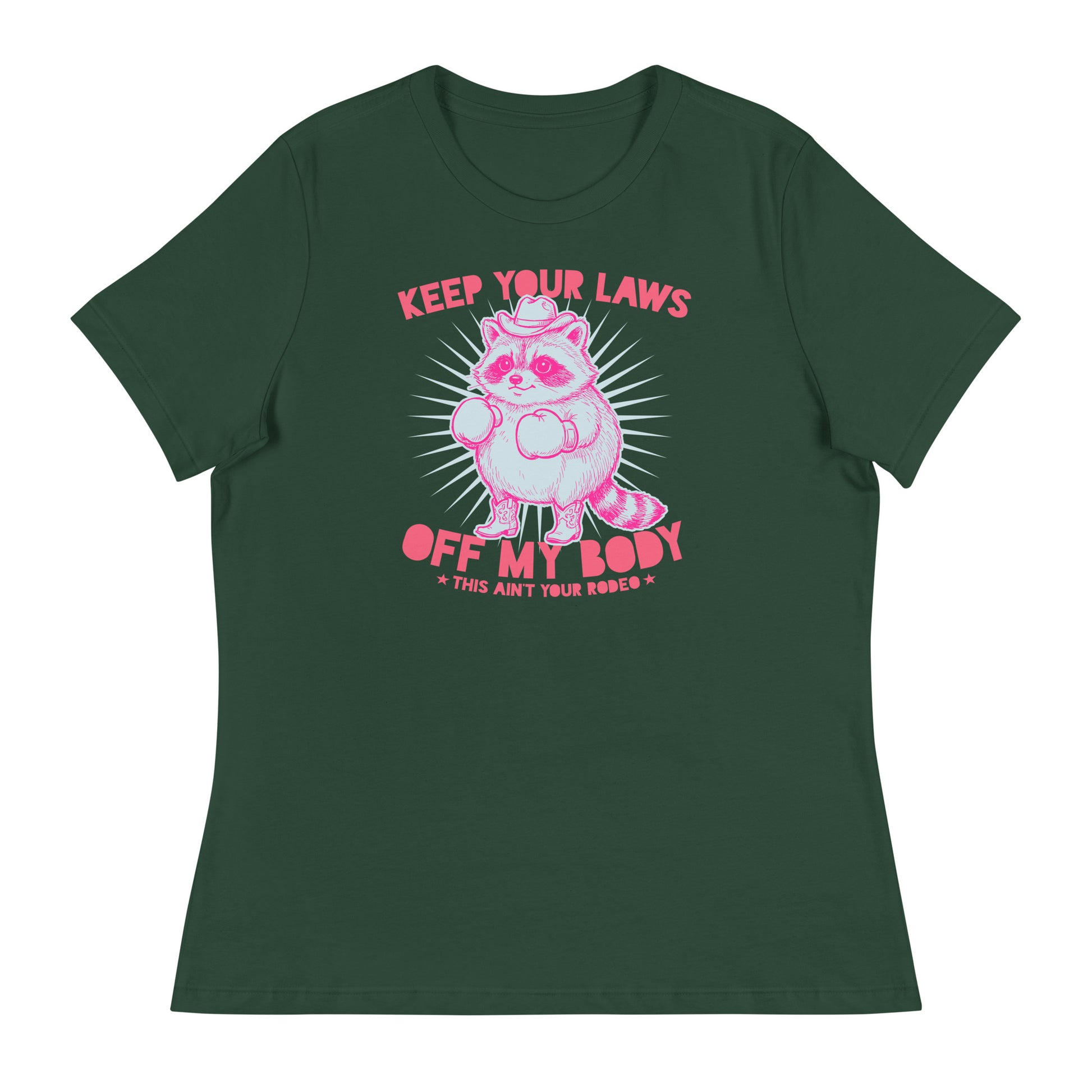 Forest green women’s relaxed T-shirt featuring pink raccoon cowboy artwork and “Off My Body” phrase in reproductive rights protest style.