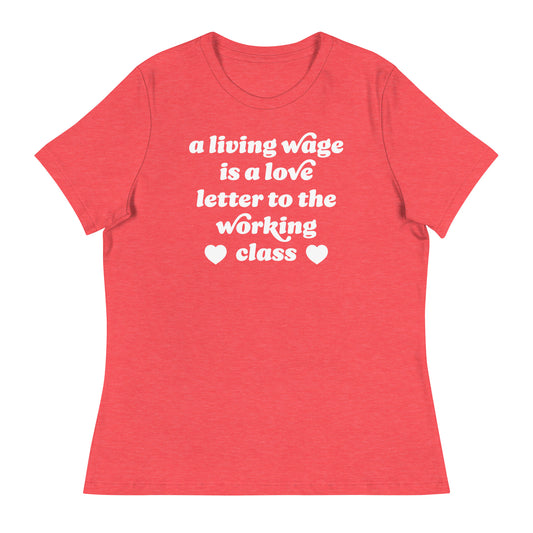 Heather red women’s relaxed t-shirt with rounded vintage-style text and hearts stating “a living wage is a love letter to the working class,” a Valentine justice-focused design.