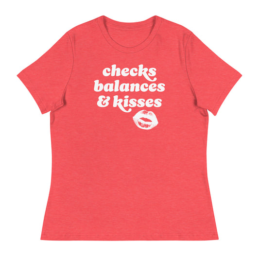 Heather red women’s relaxed t-shirt displaying rounded vintage text and lips illustration with the phrase “checks balances & kisses,” a justice-focused Valentine design.