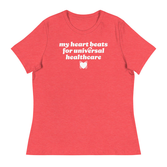 Heather red women’s relaxed t-shirt displaying “my heart beats for universal healthcare,” blending Valentine aesthetics with a justice-focused design supporting universal healthcare access.